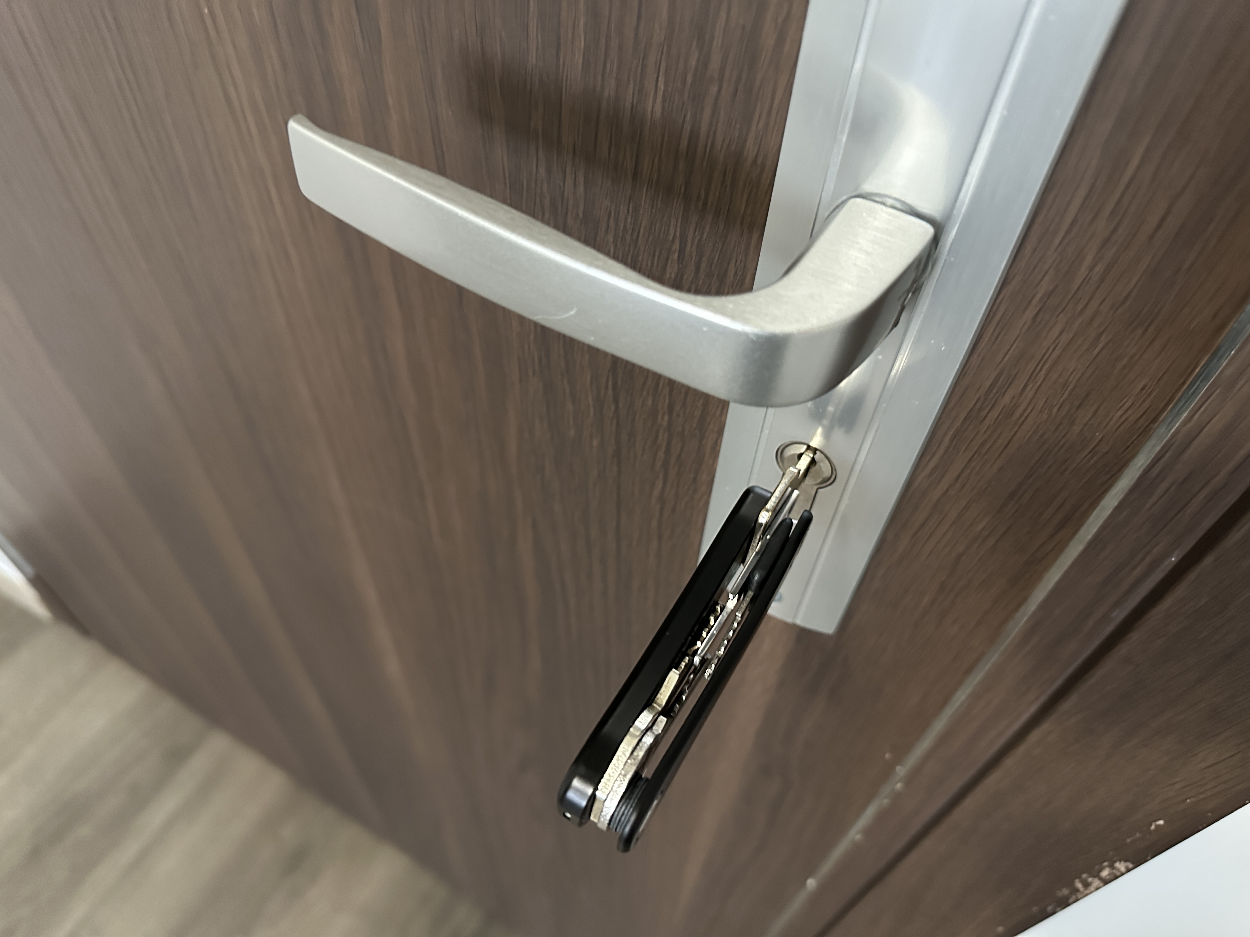 keysmart hanging from door handle