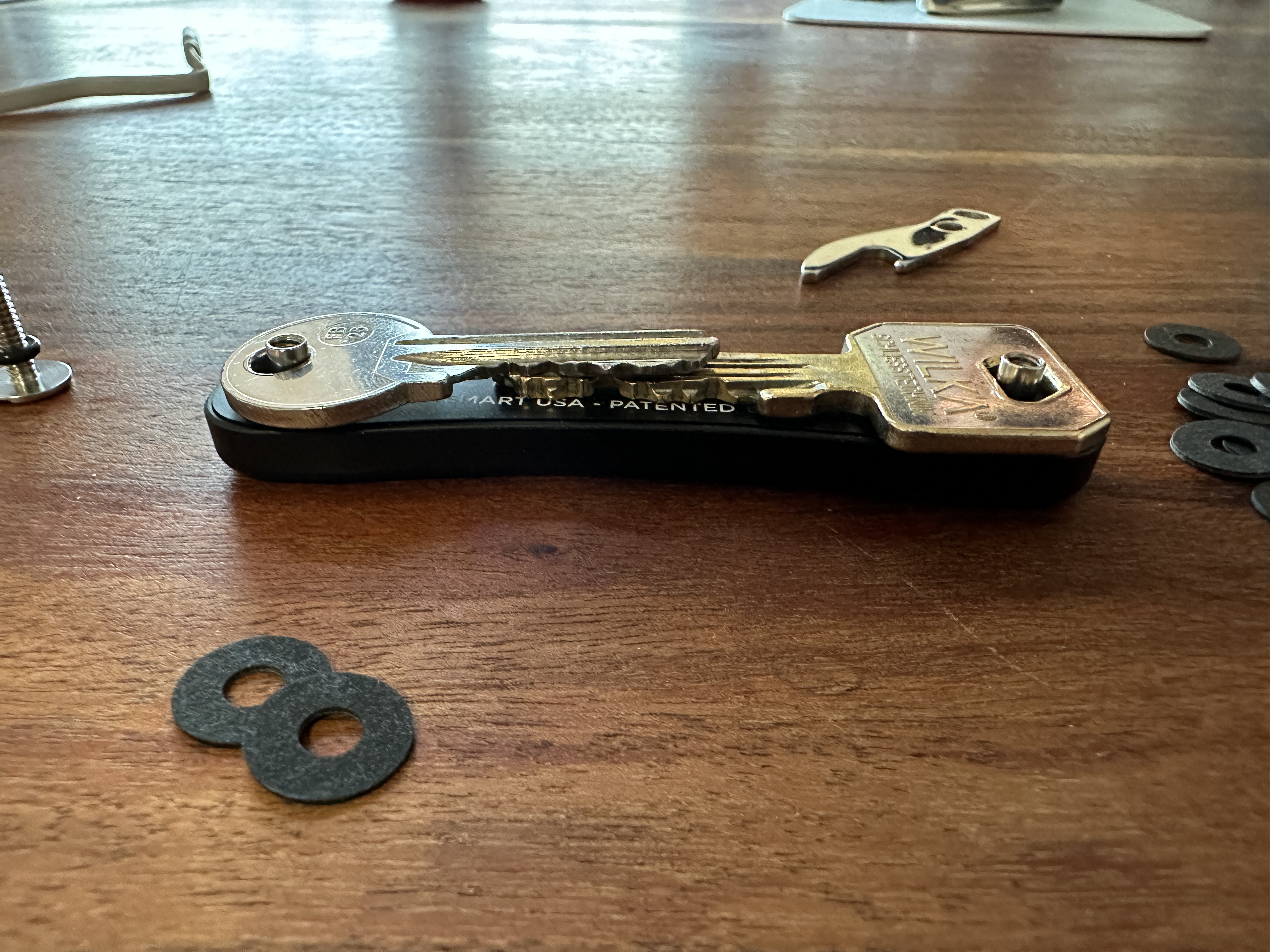 keysmart on table with parts