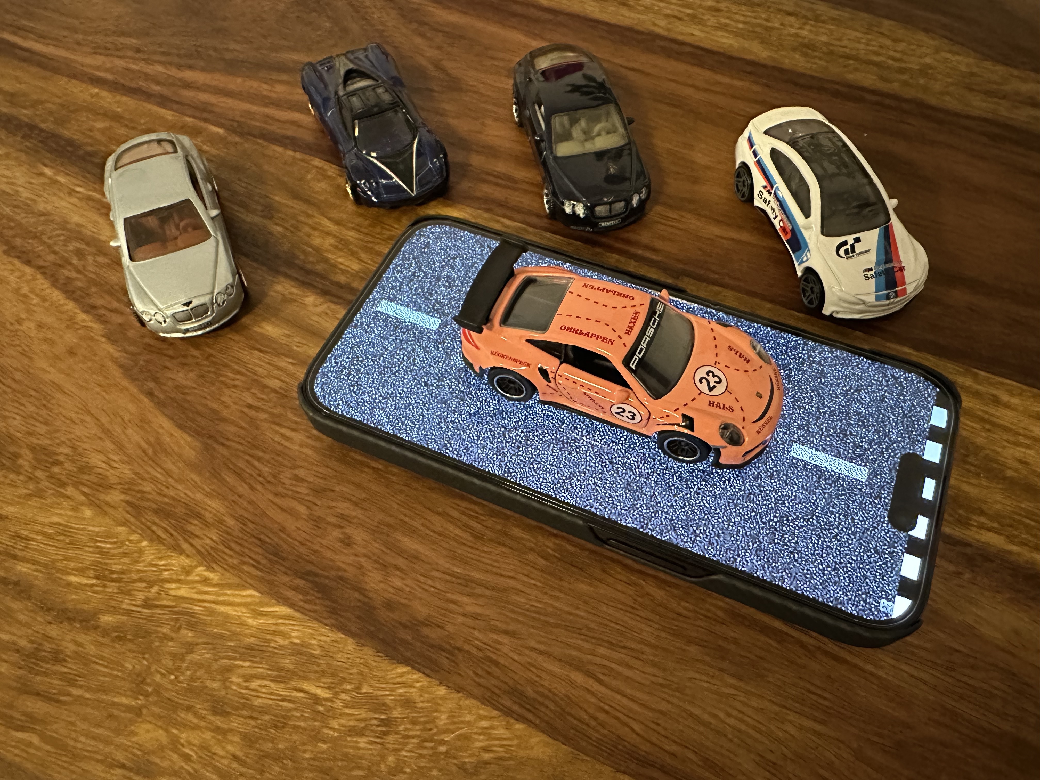 mini cars on phone road