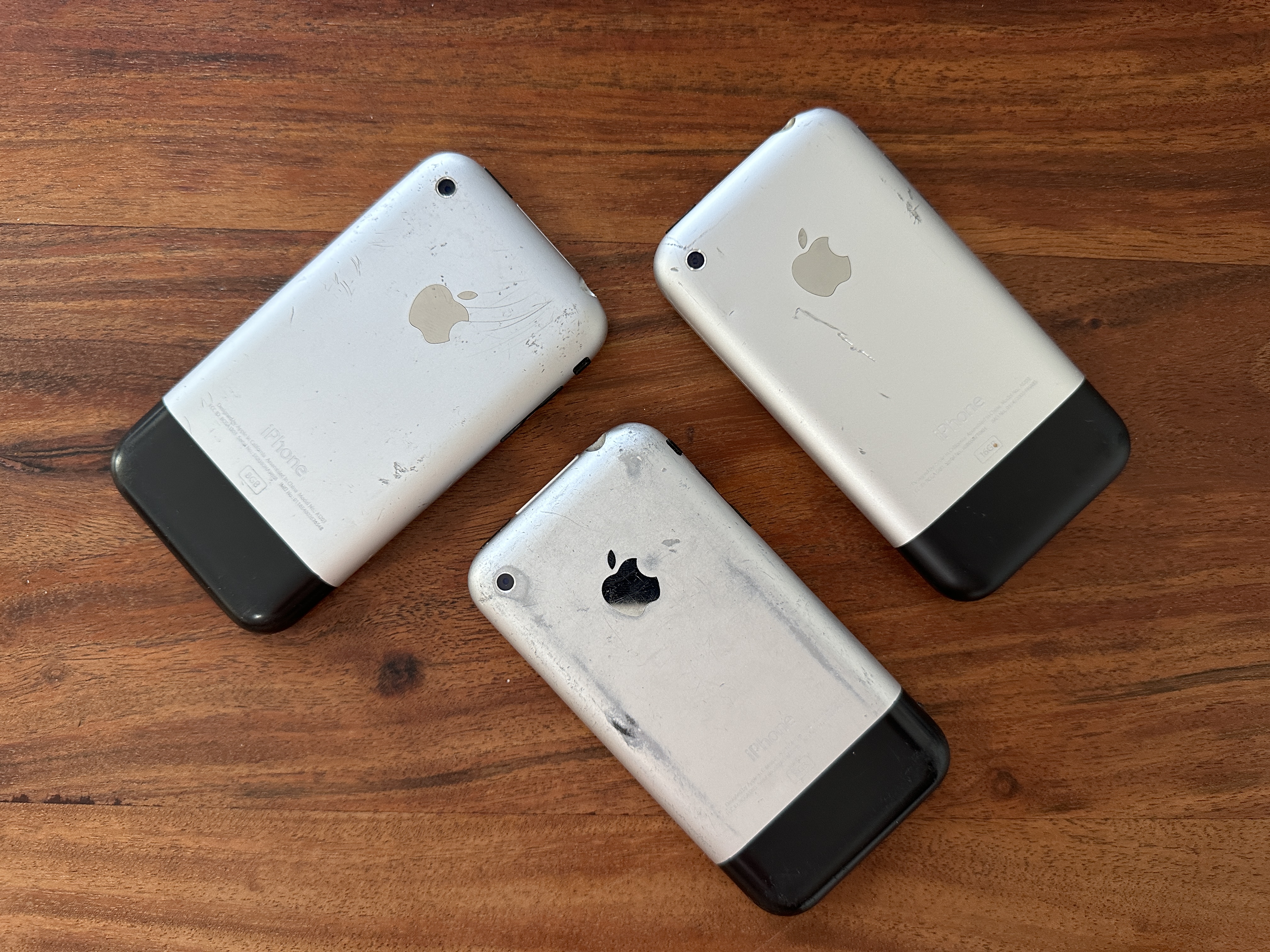 three old iphones back