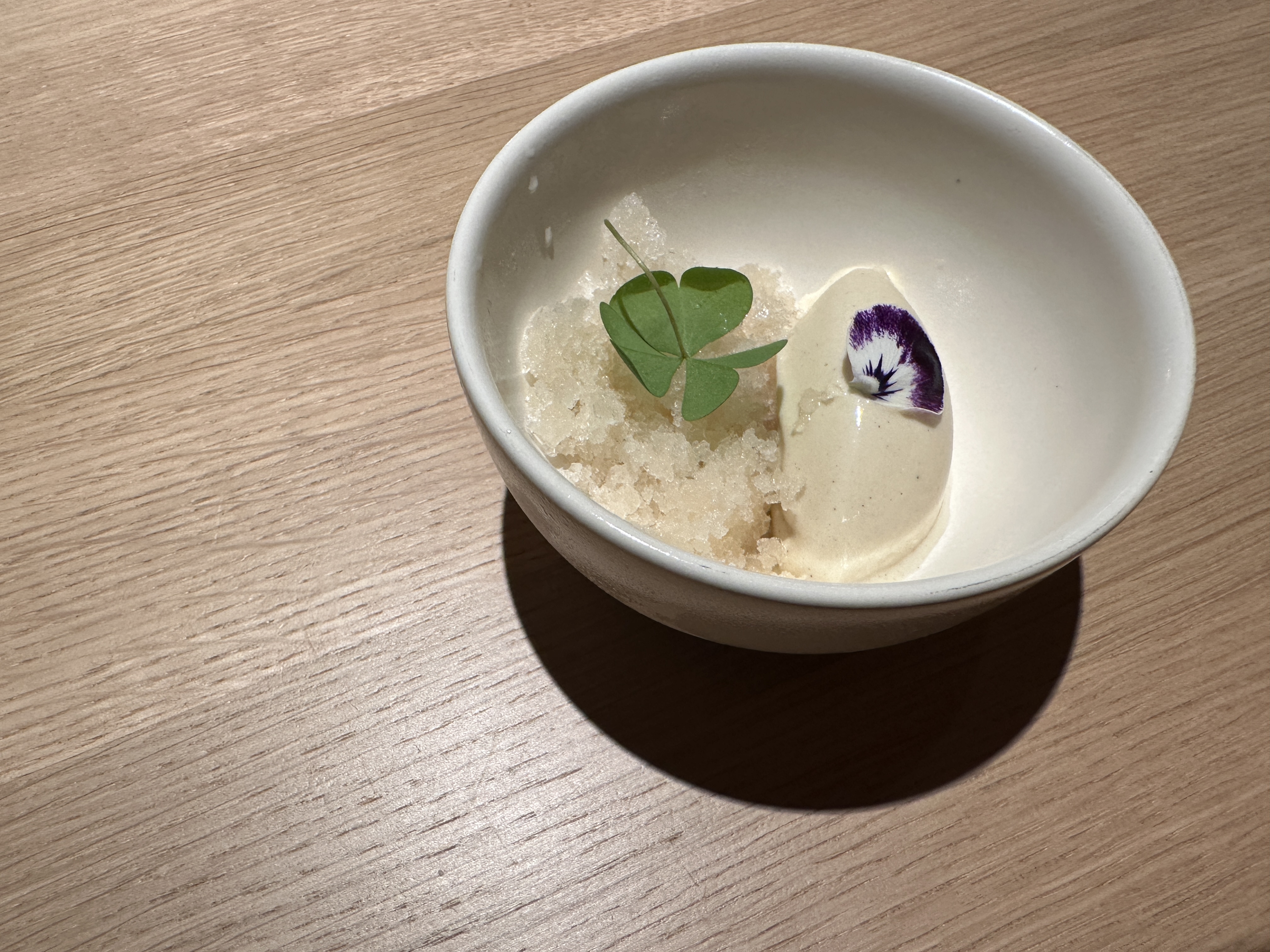 dessert with flower garnish
