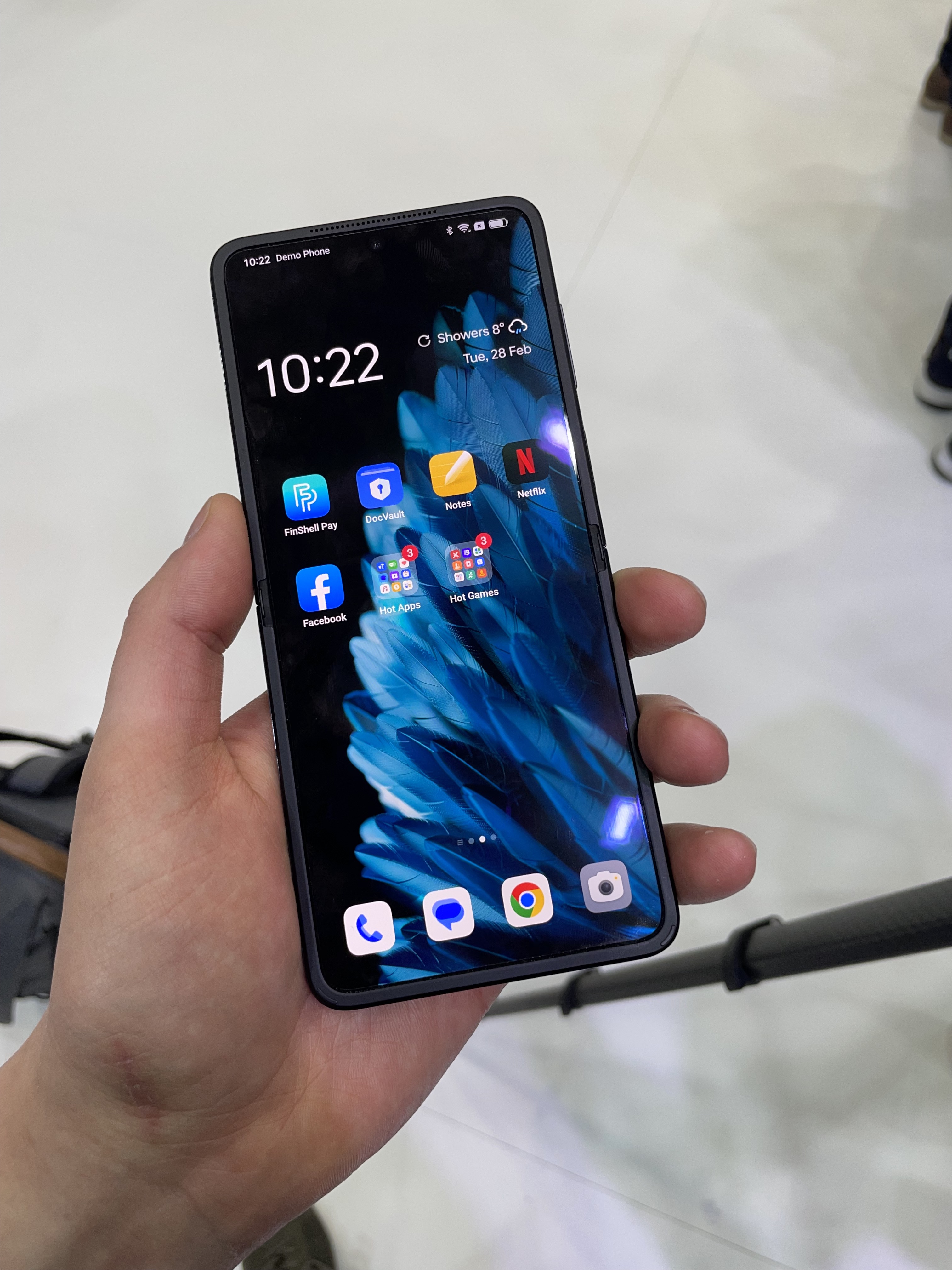 hand holding smartphone hand holding smartphone