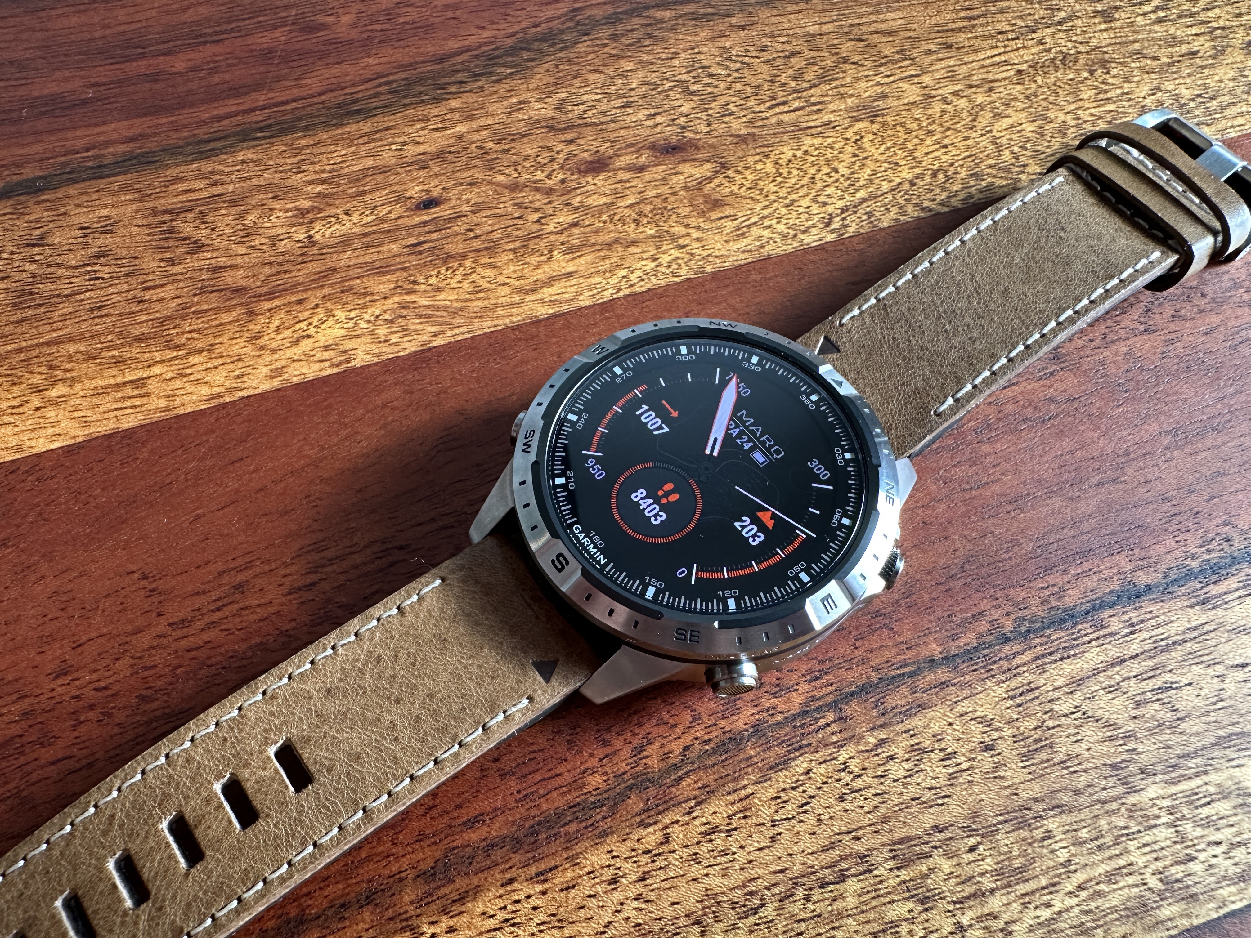 smartwatch on tree bark