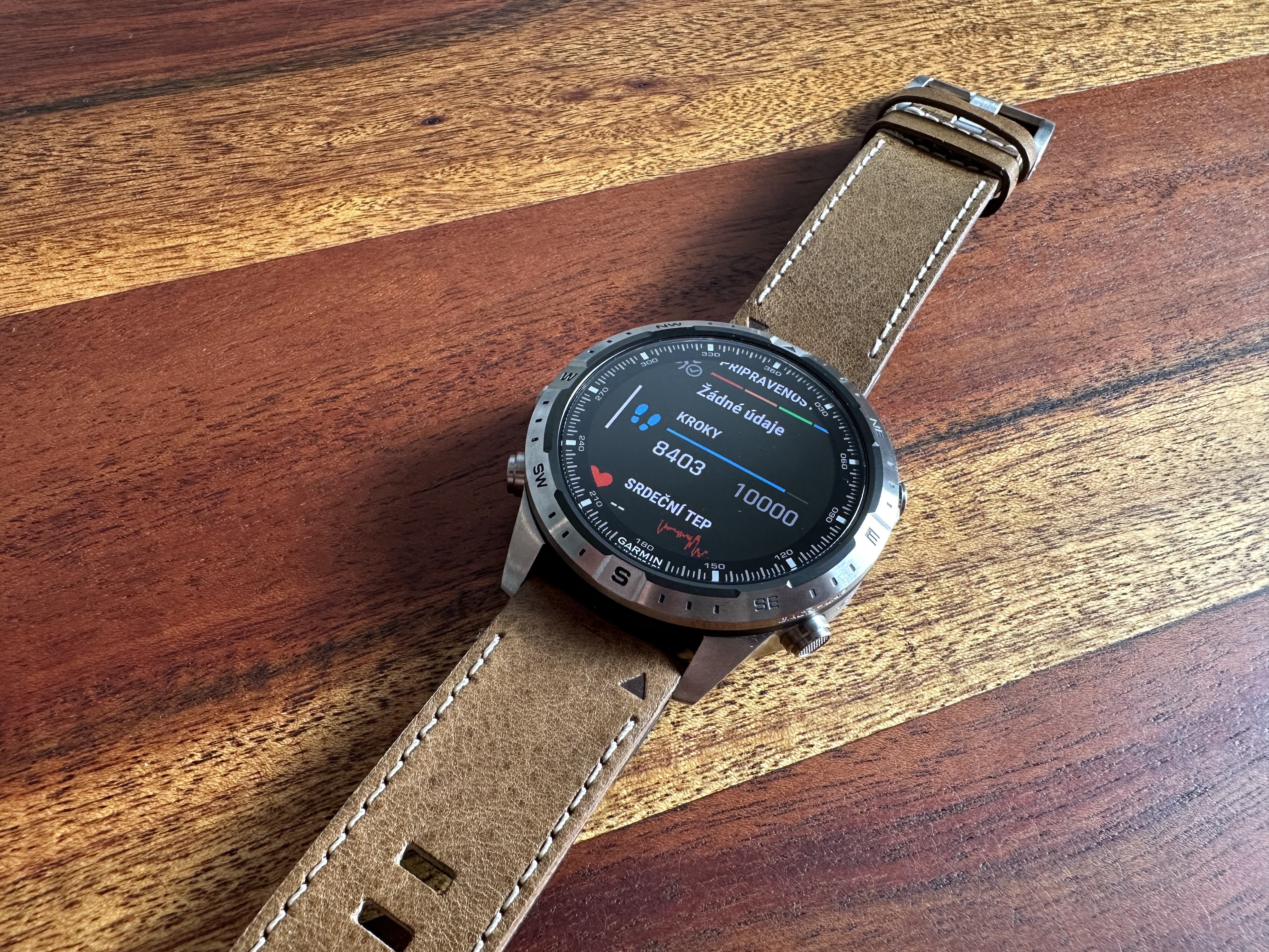 smartwatch on wooden table