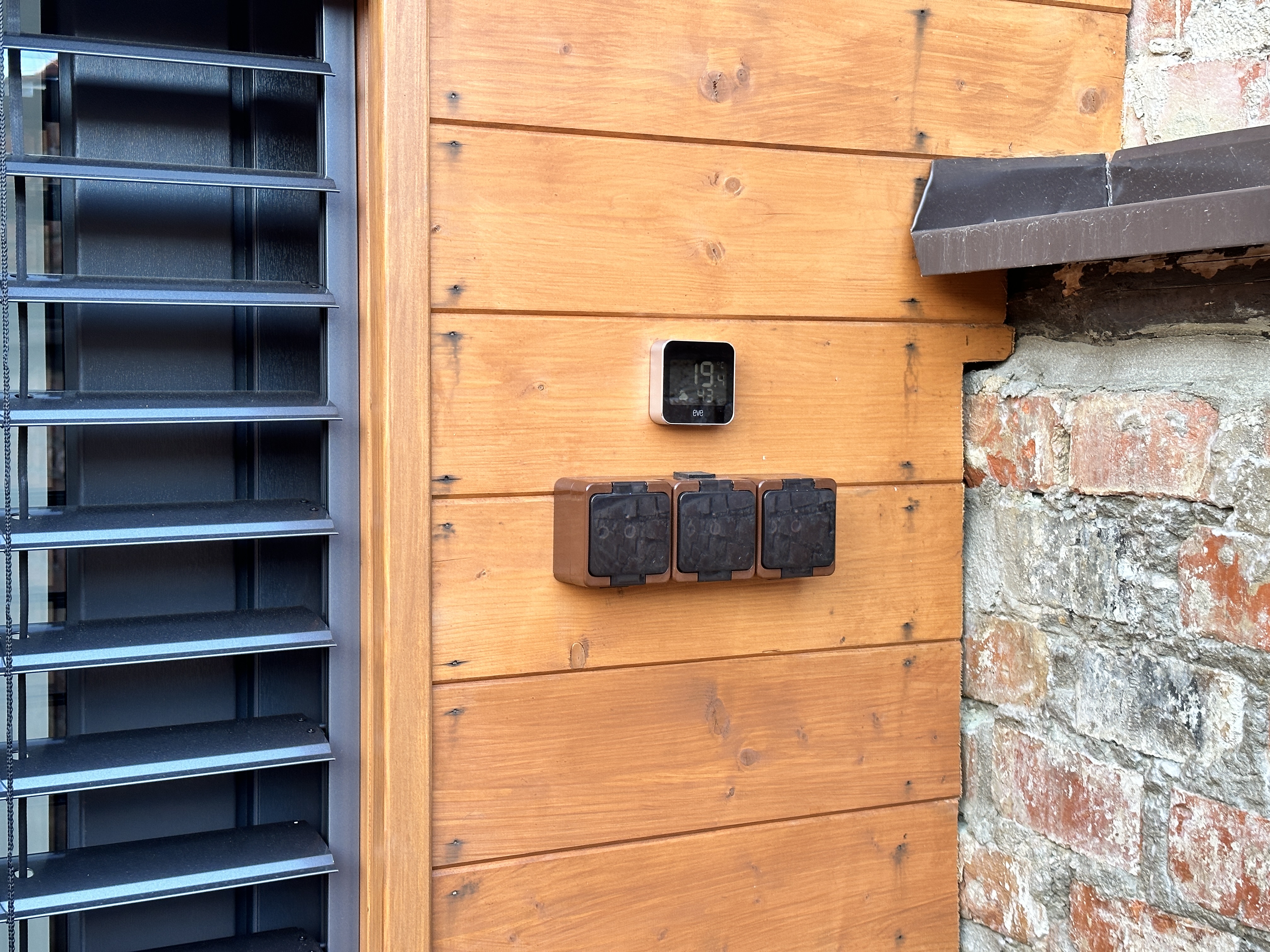 wooden wall with electrical outlets