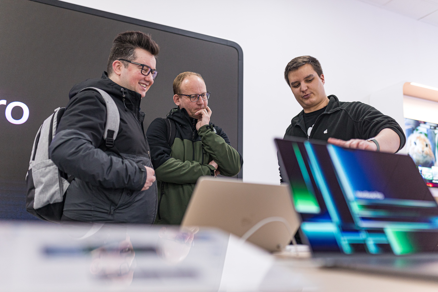 customers discussing laptops