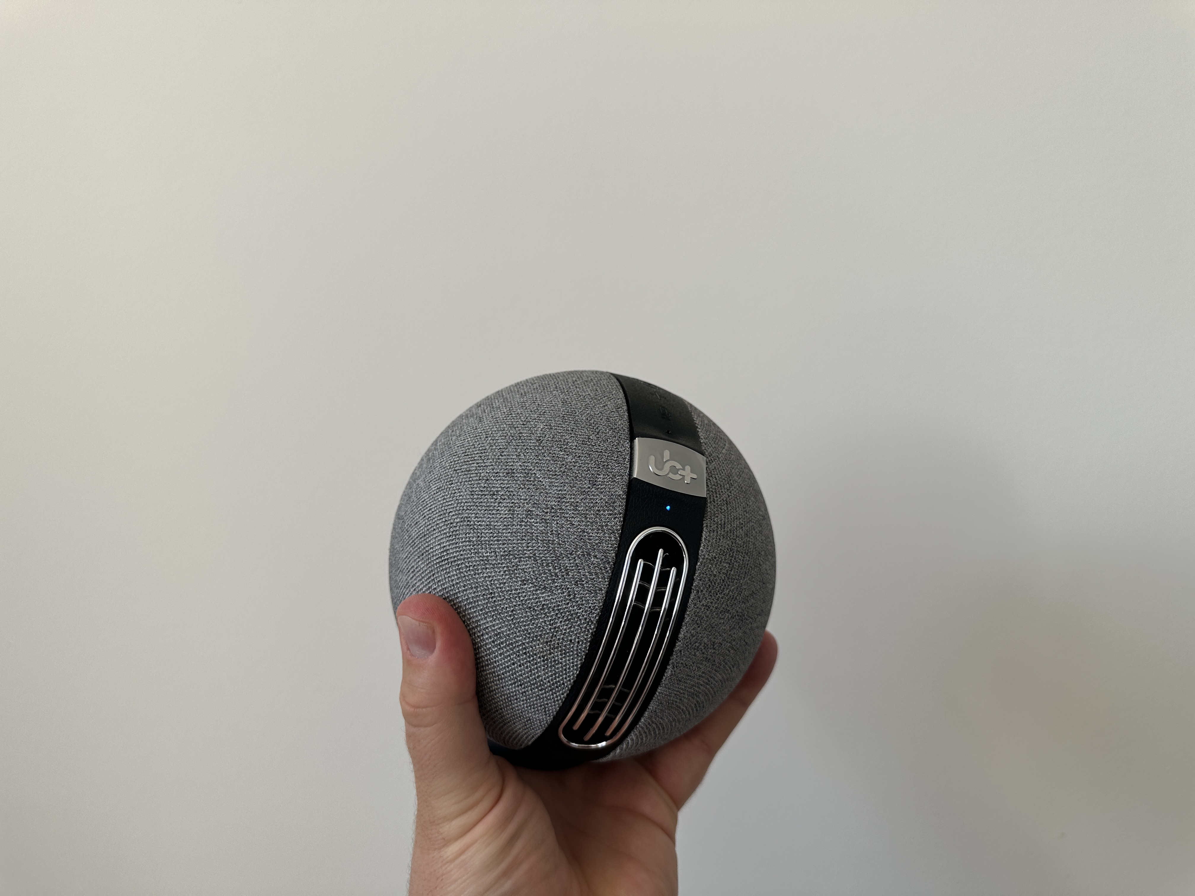 hand holding speaker front