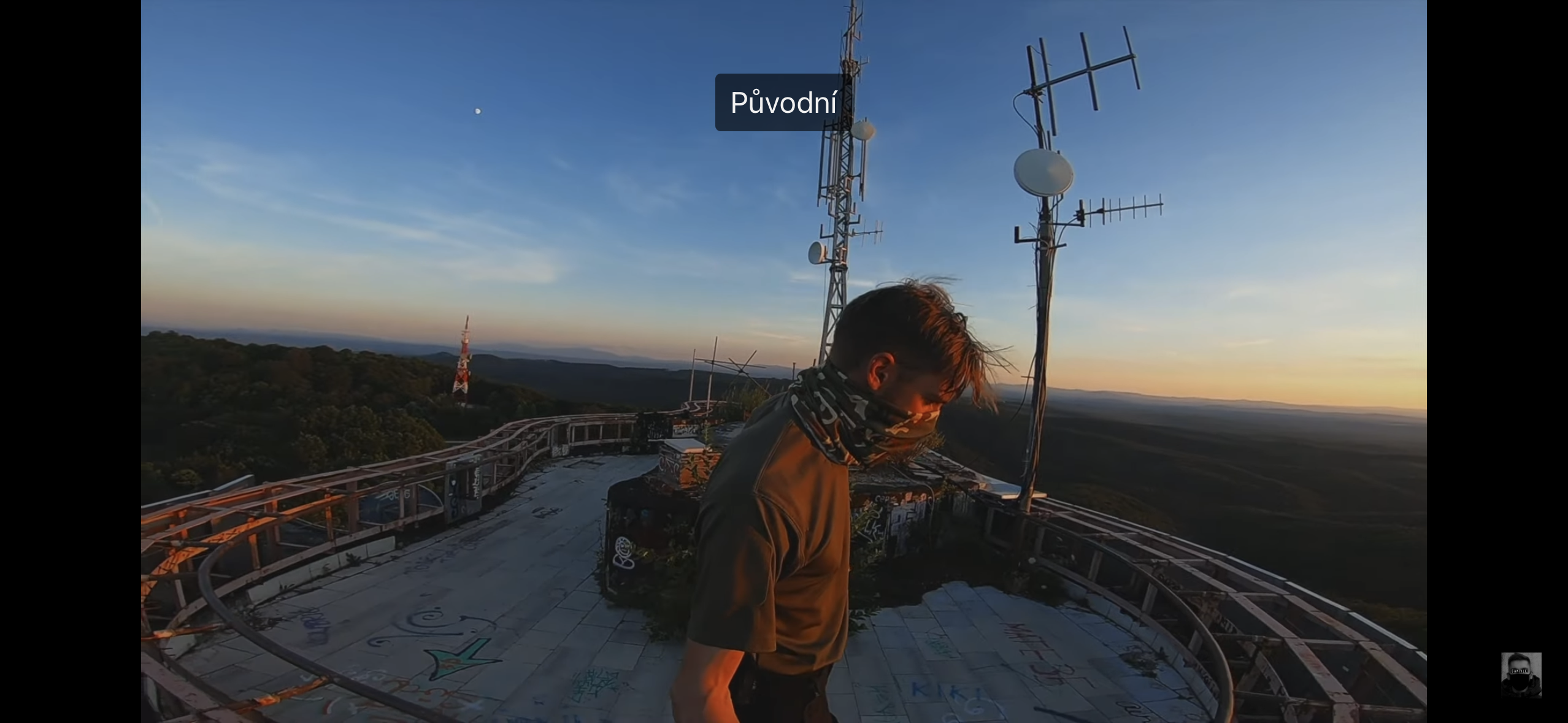 man on rooftop antennas