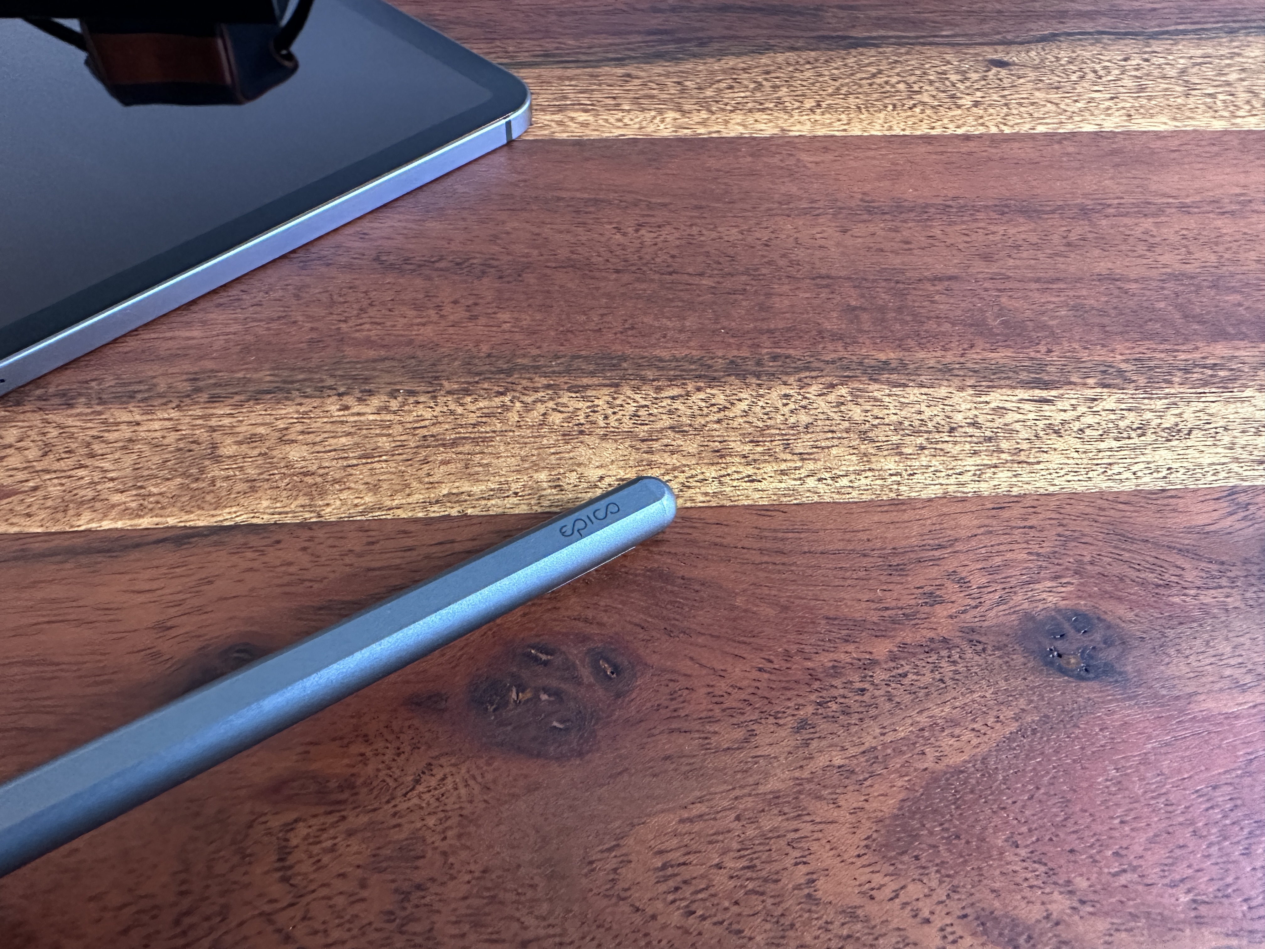 stylus on wooden table
