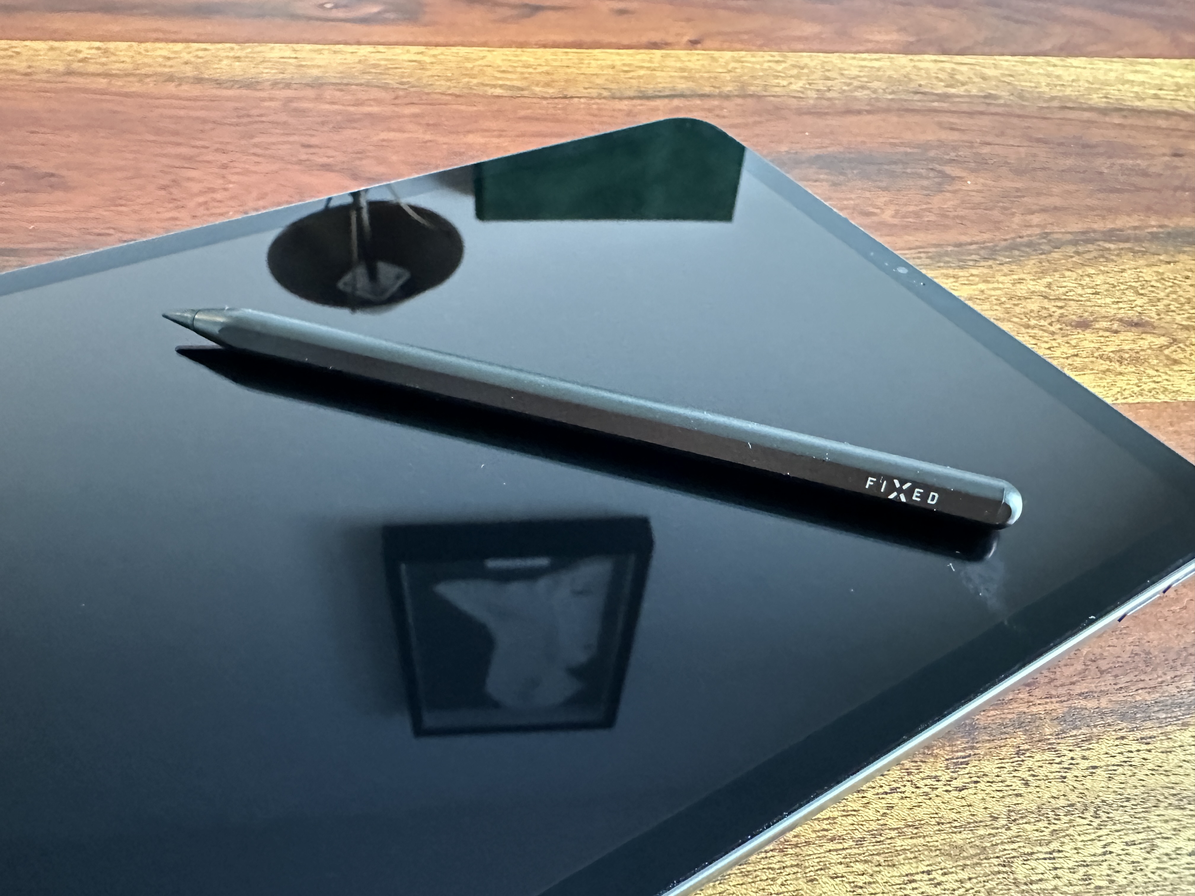 stylus on tablet screen