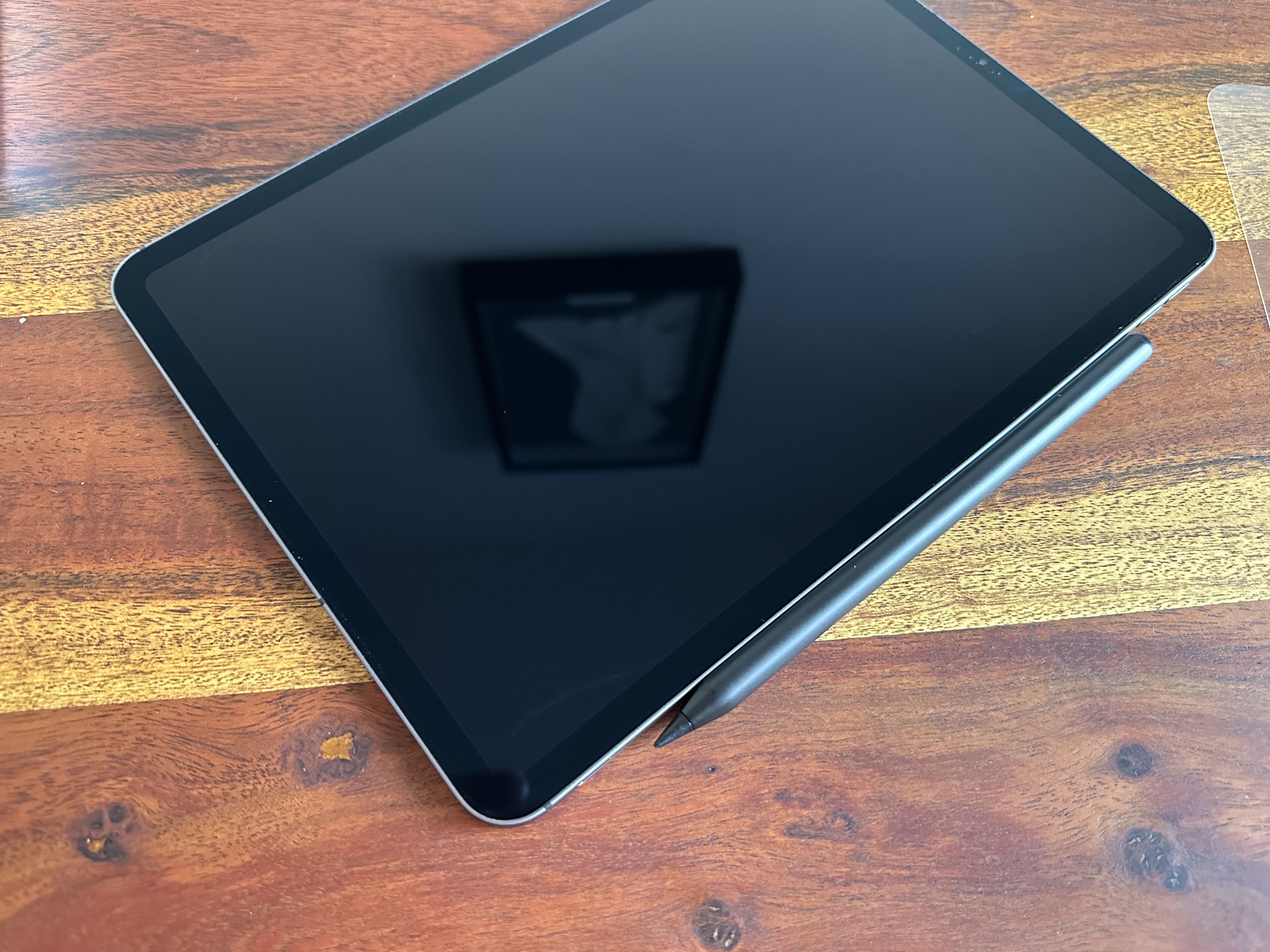 tablet on wooden surface