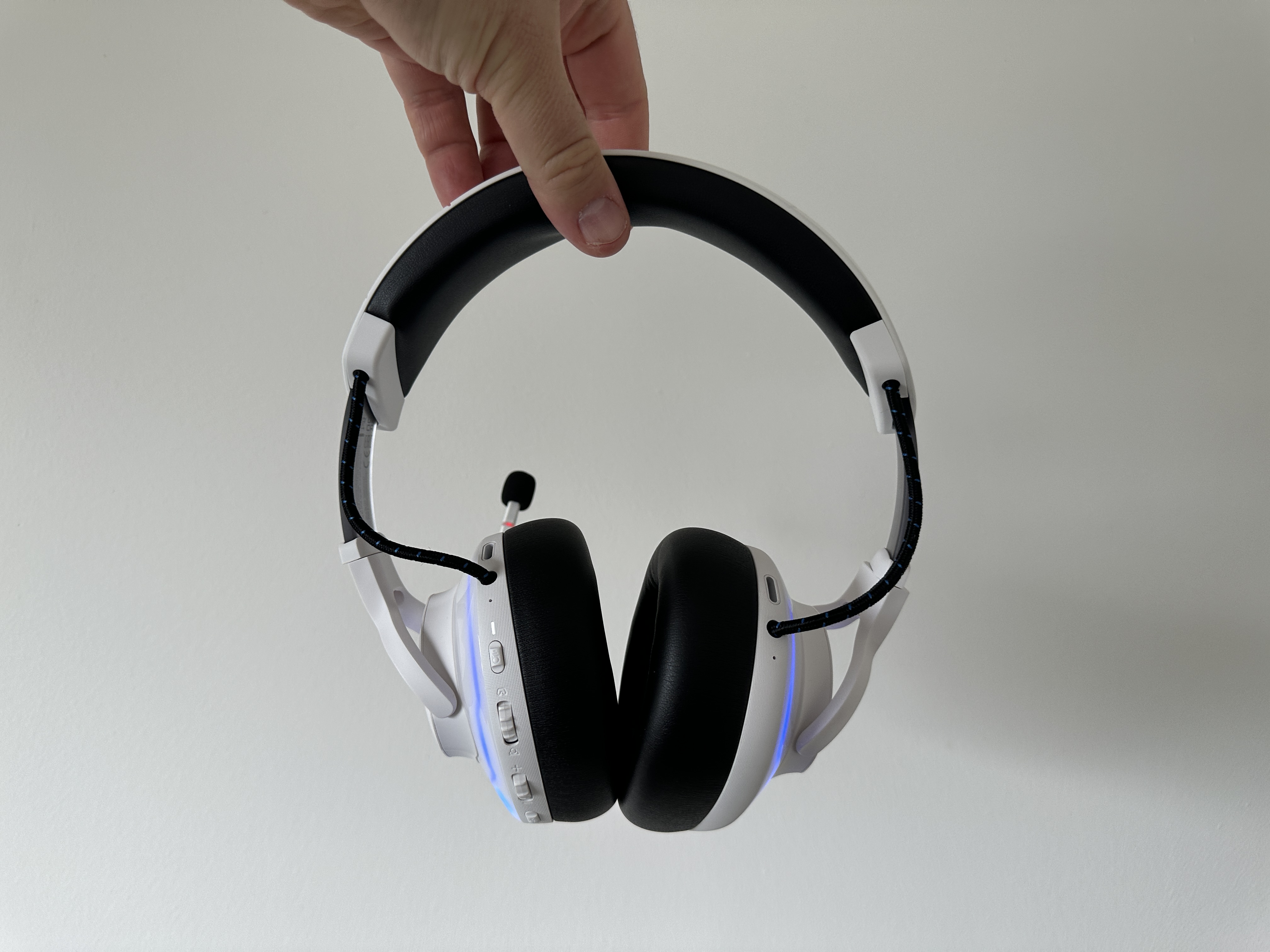 hand holding headset front view