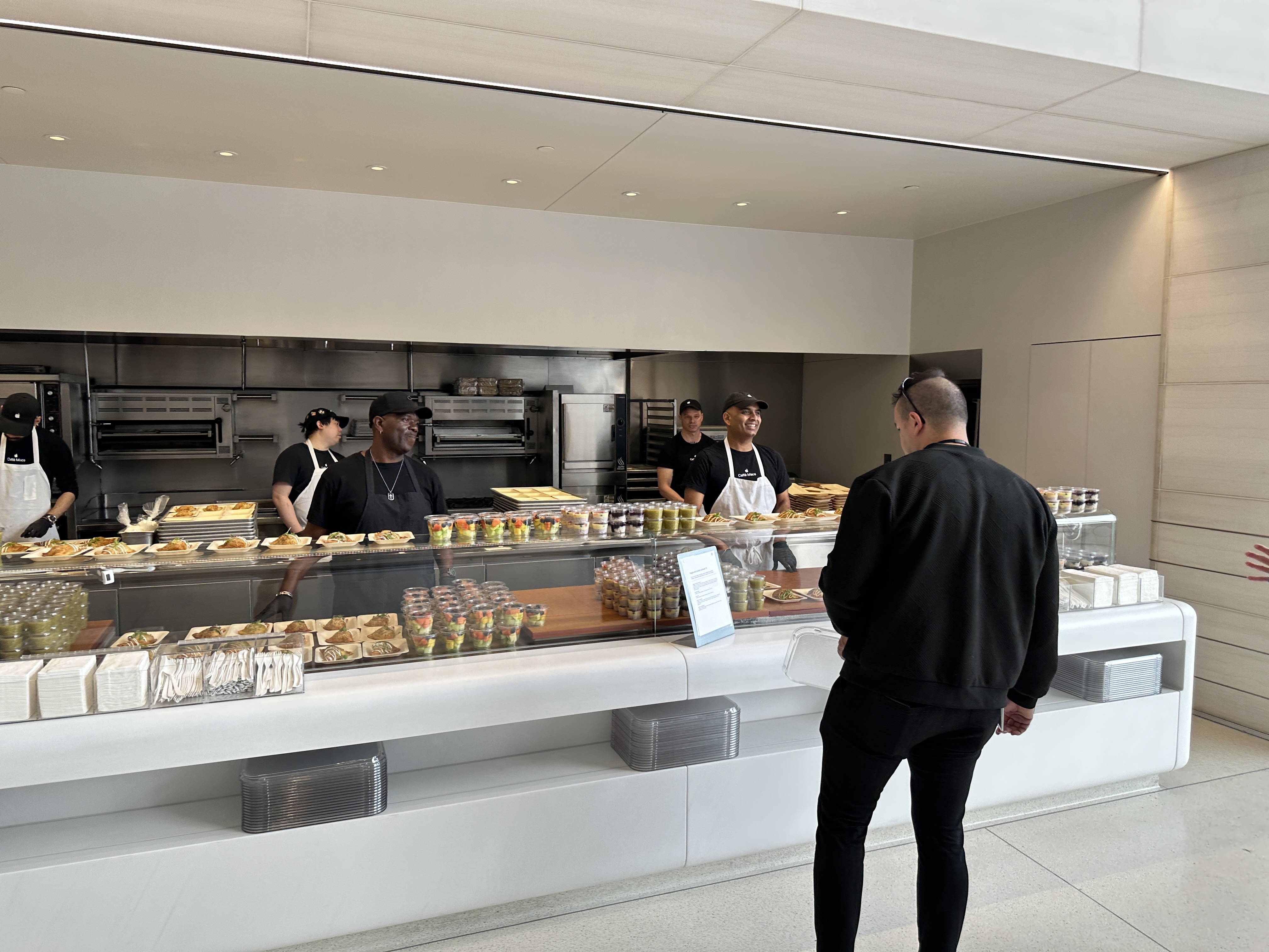 cafeteria counter staff serving