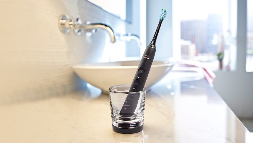 electric toothbrush on bathroom counter