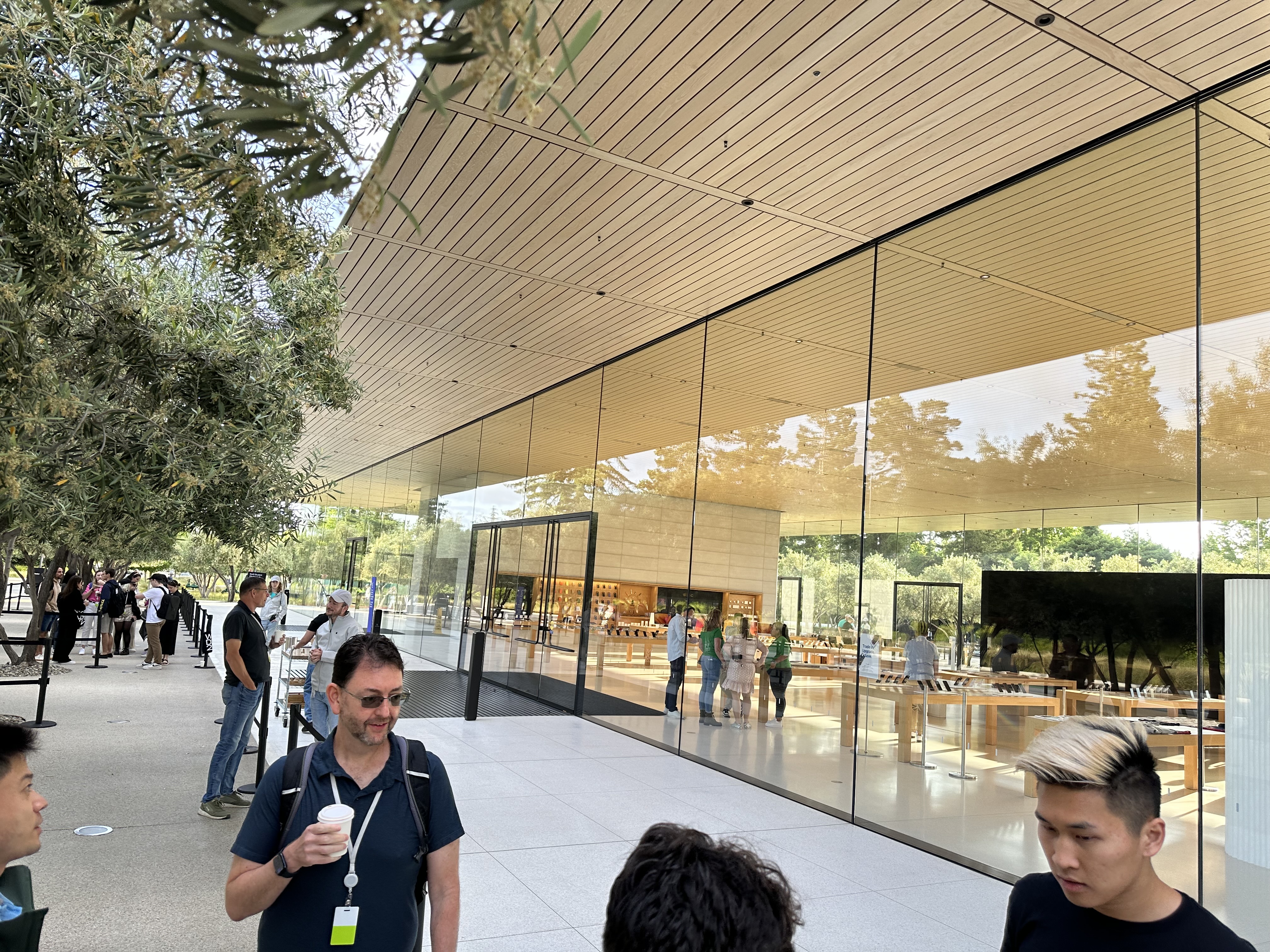 glass building with people