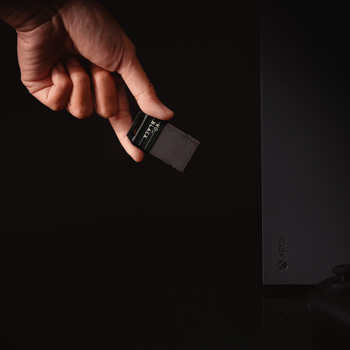 hand holding xbox storage card
