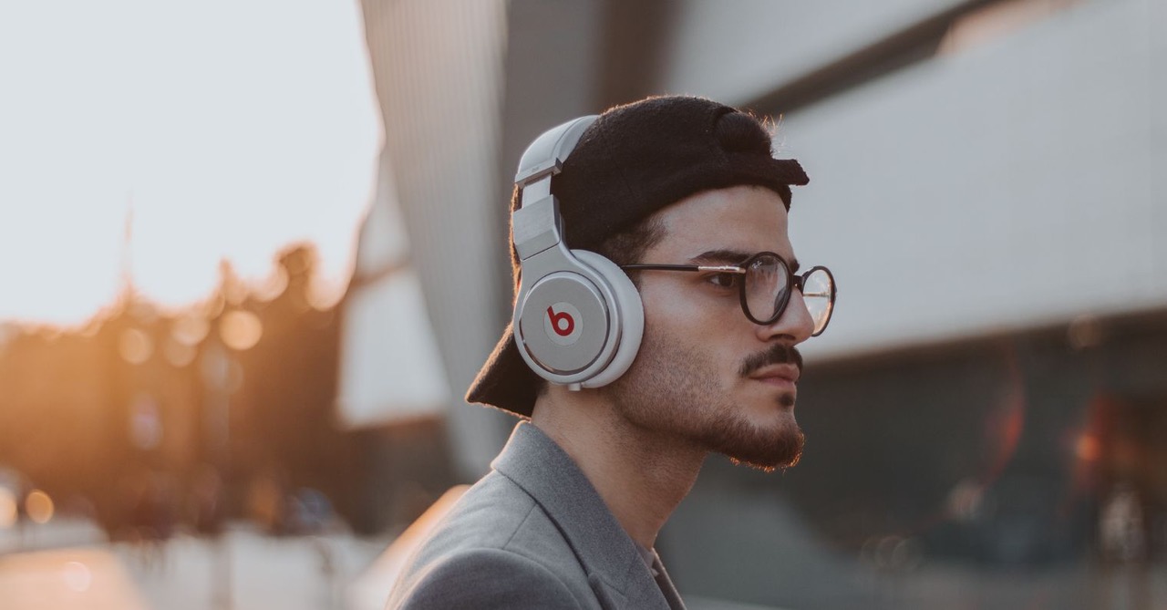 man wearing headphones outdoors