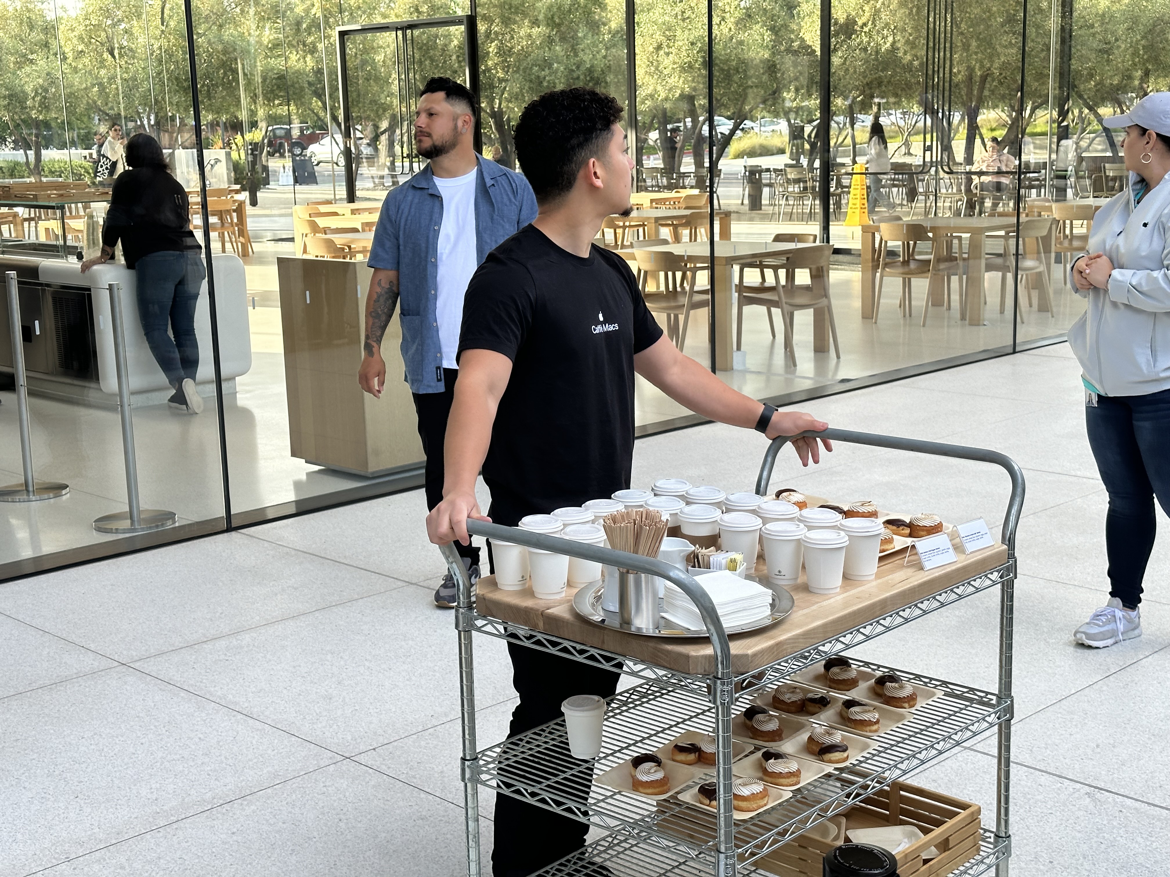 man with coffee cart