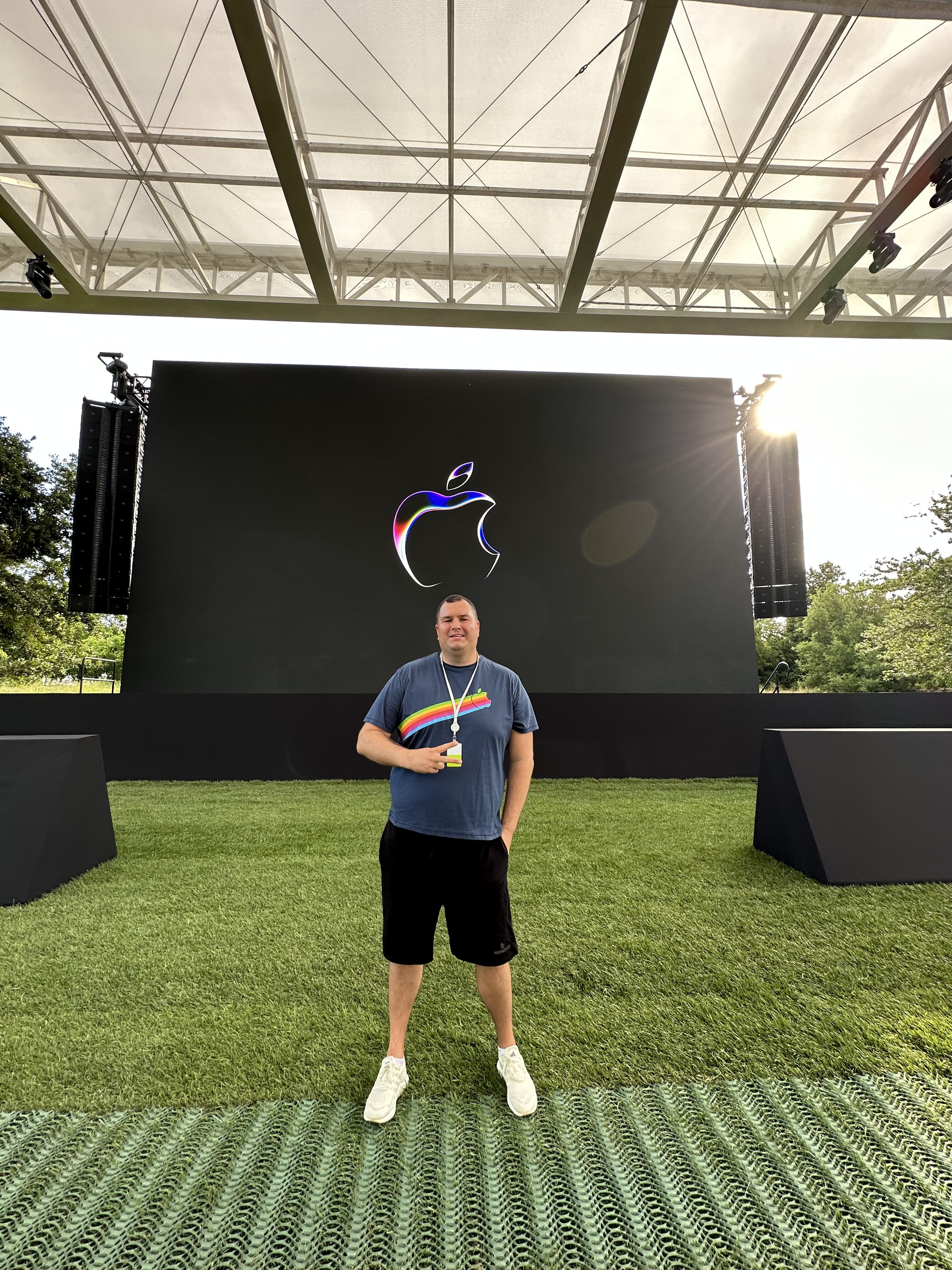 person standing apple logo