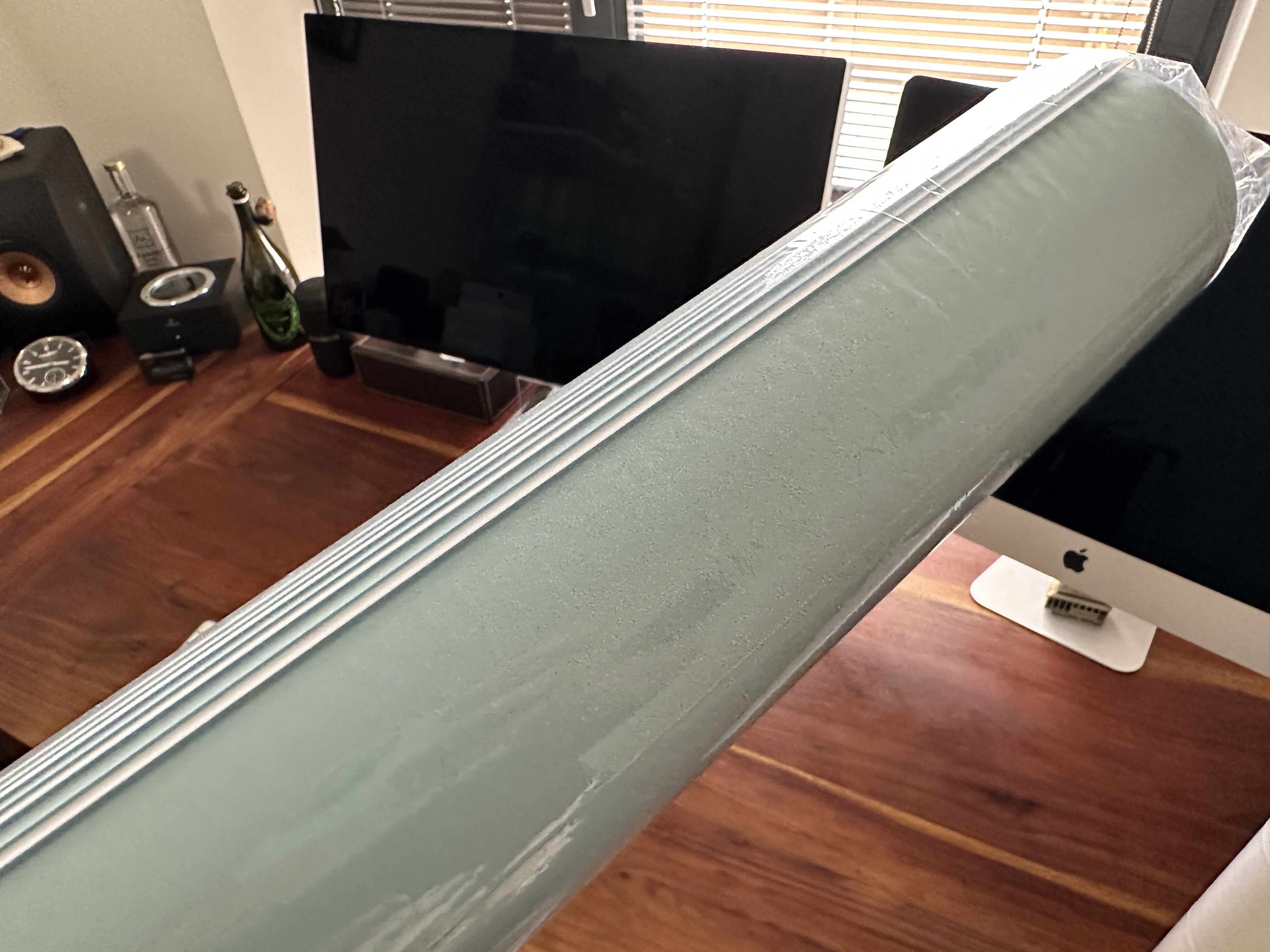 rolled up mat on desk