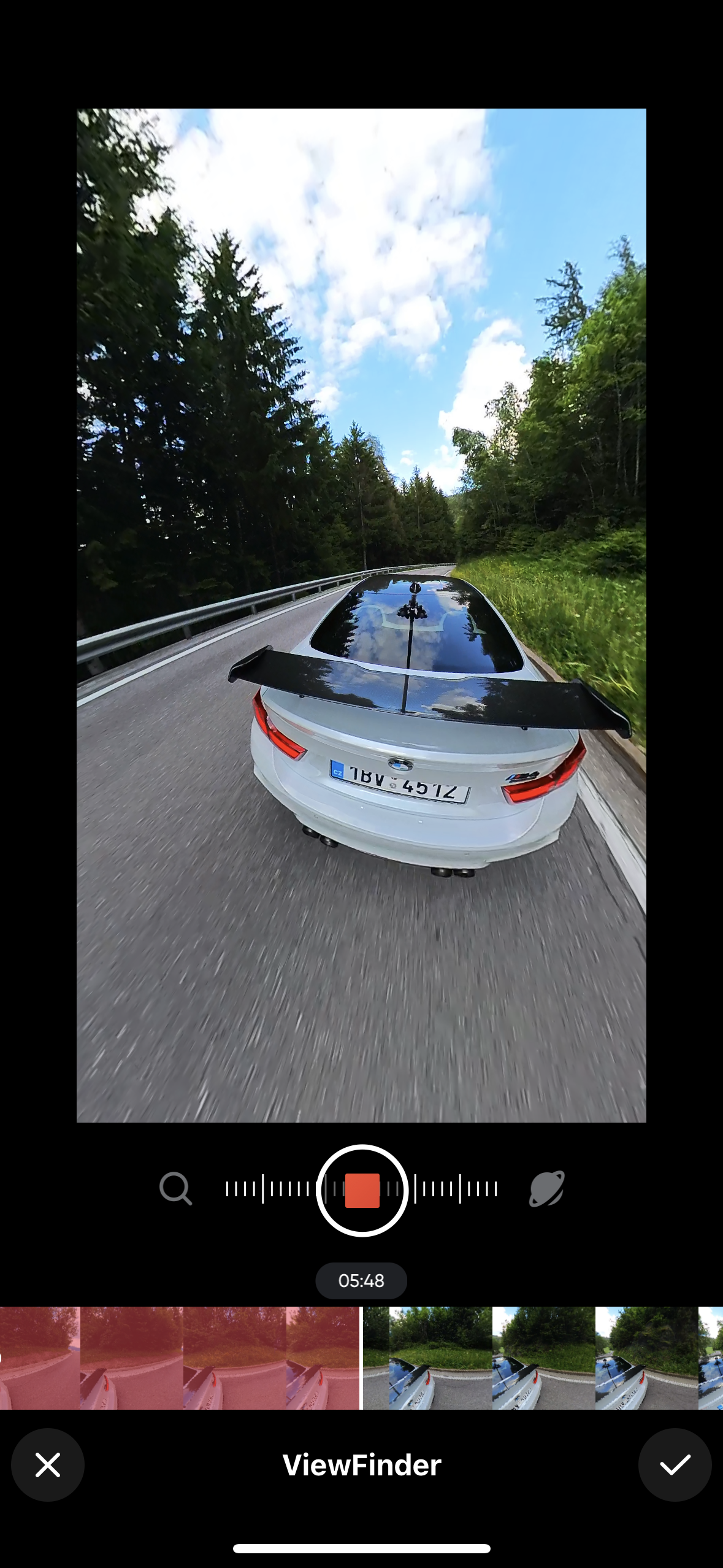 car driving through forest
