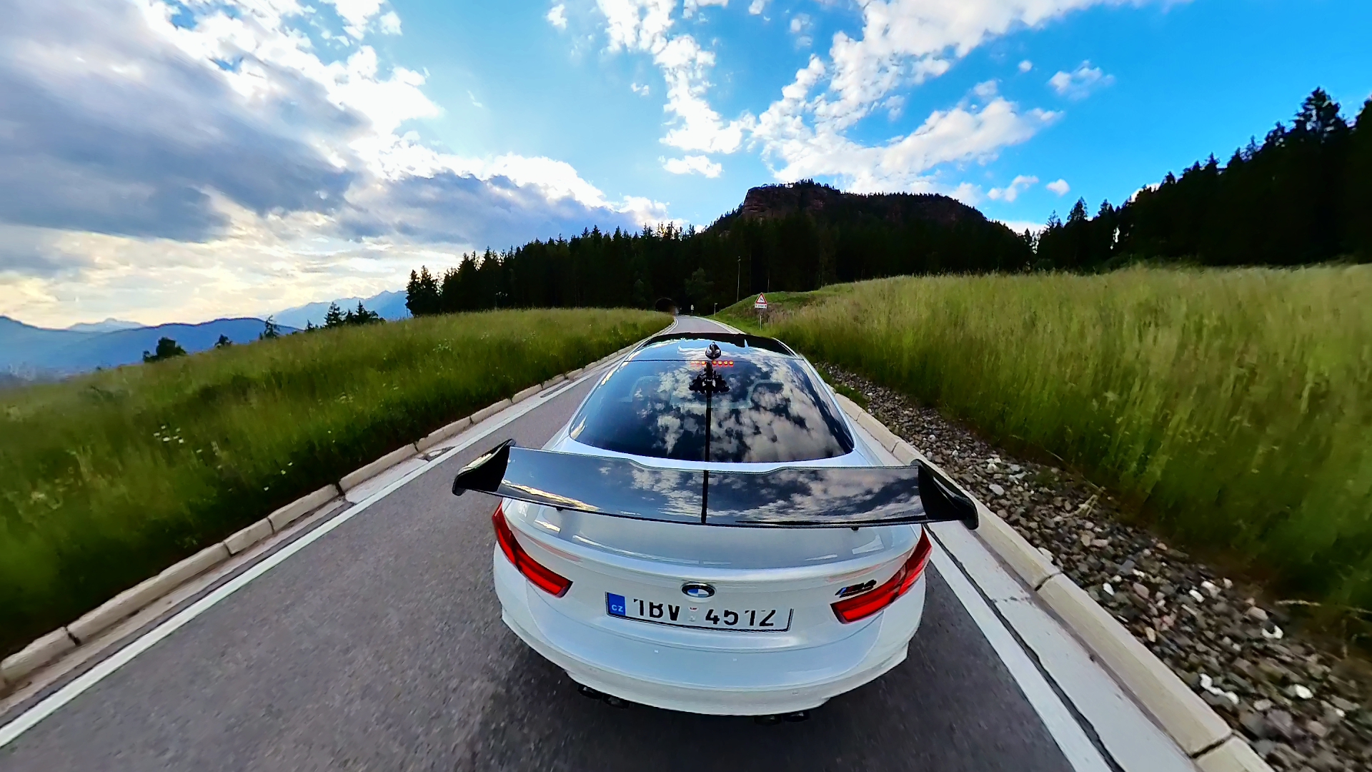 car driving through scenic road