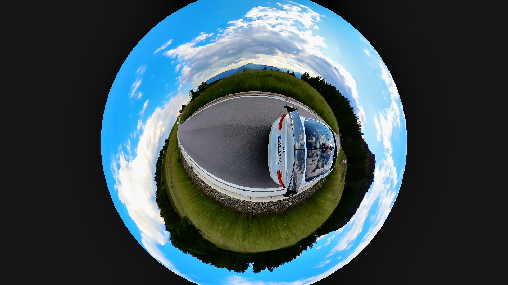 car on spherical road