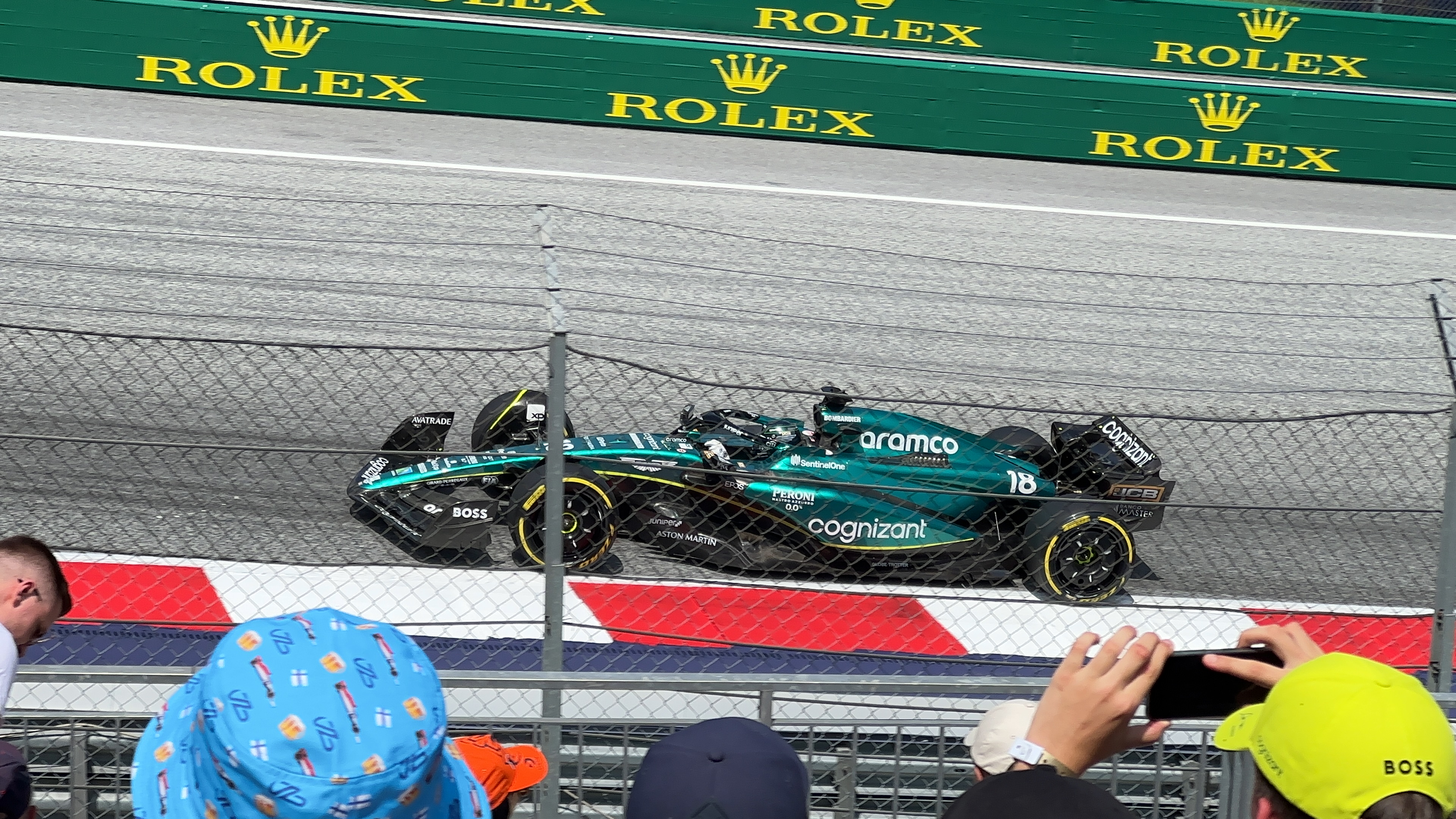 green formula one car closeup