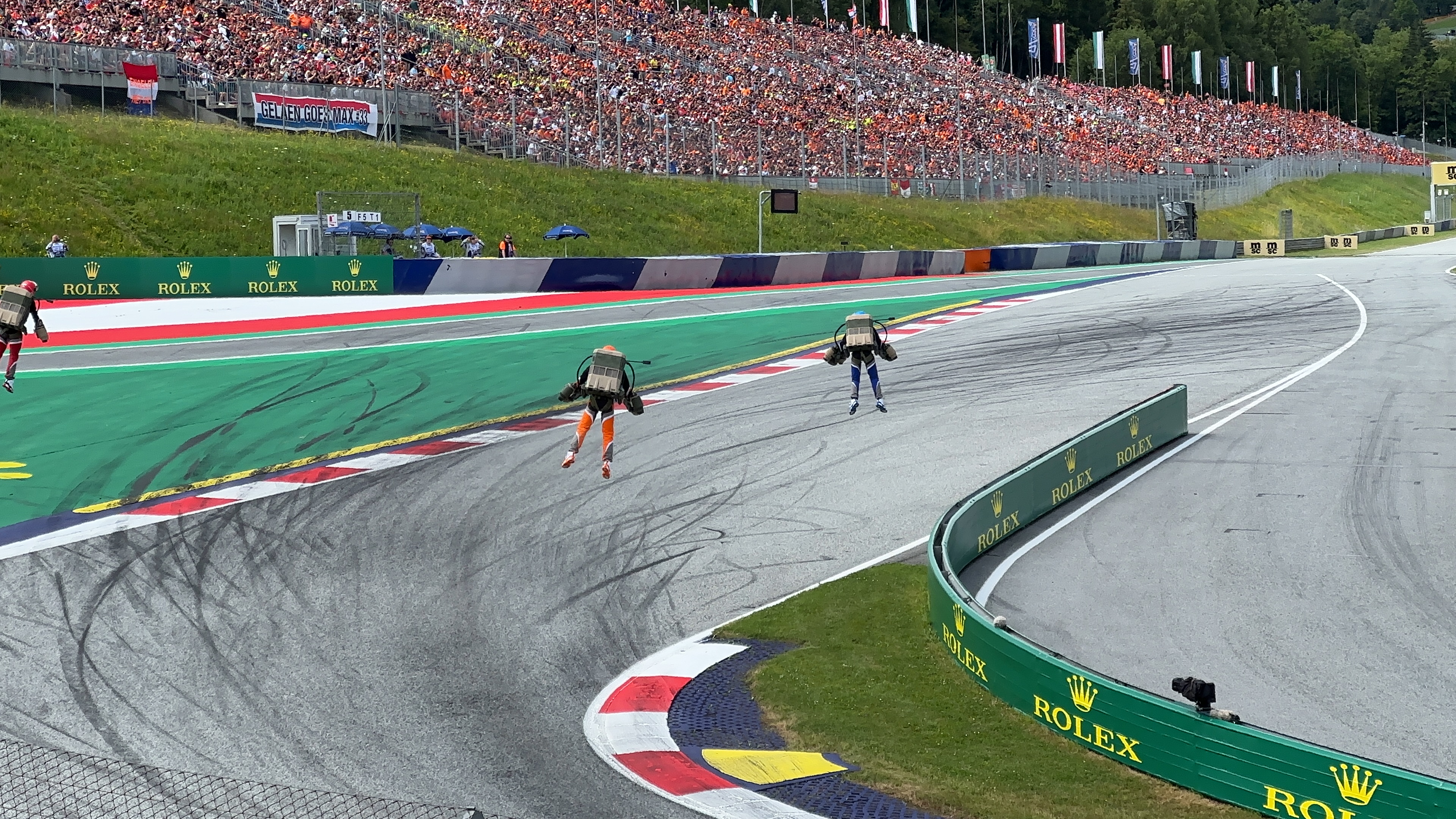 paragliders over race track