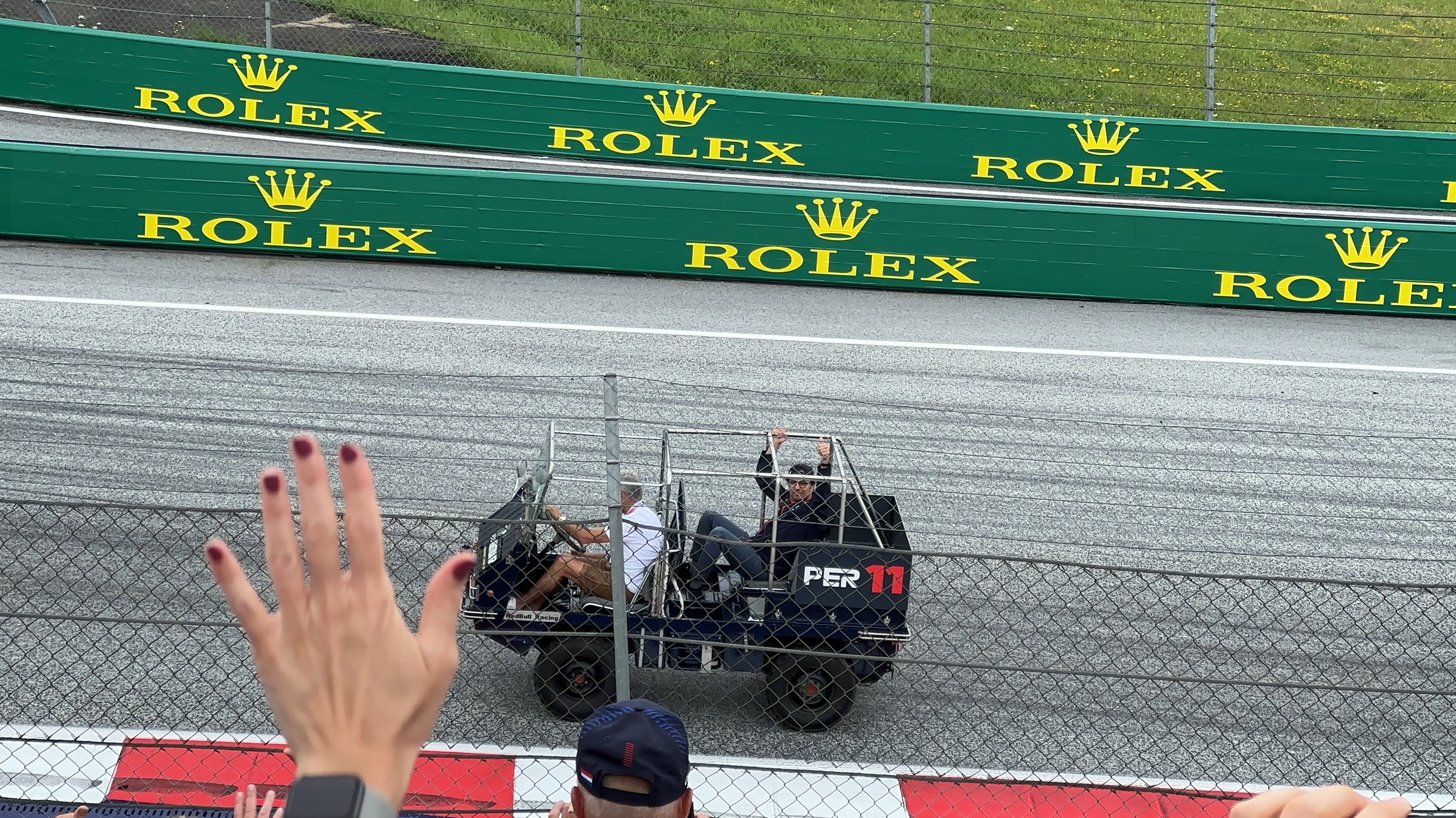 people in vehicle on track