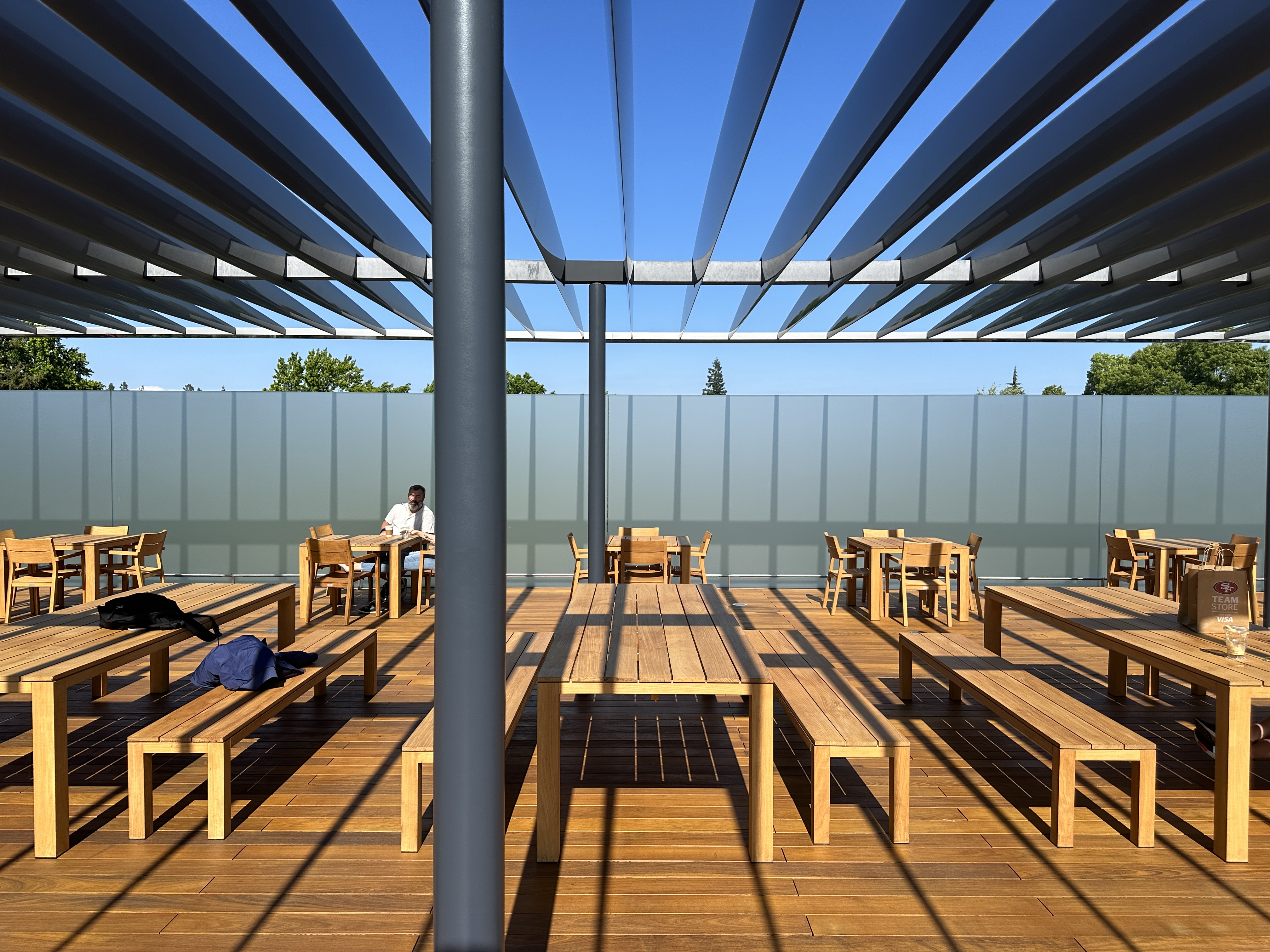 pergola with wooden benches