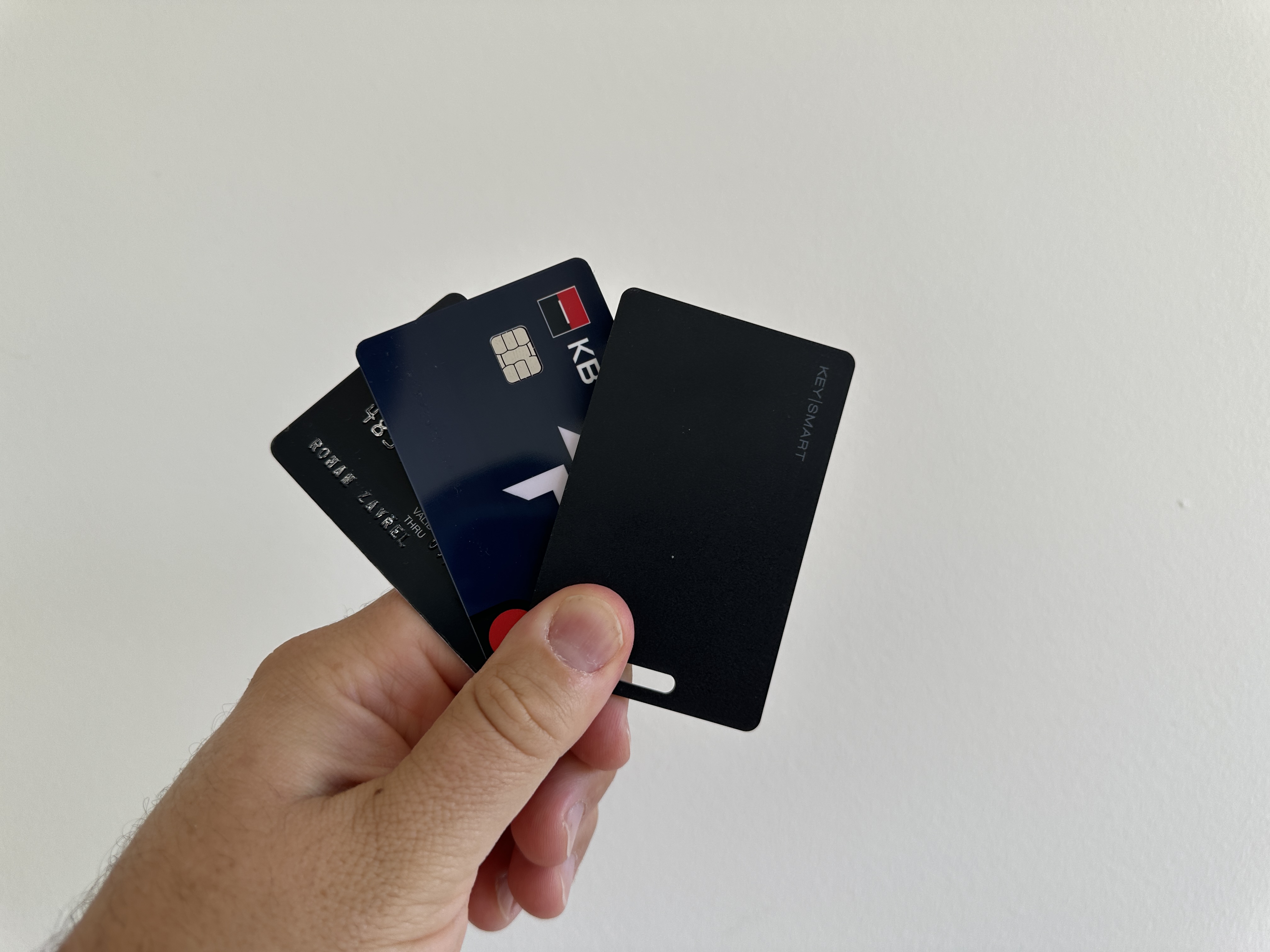 hand holding credit cards