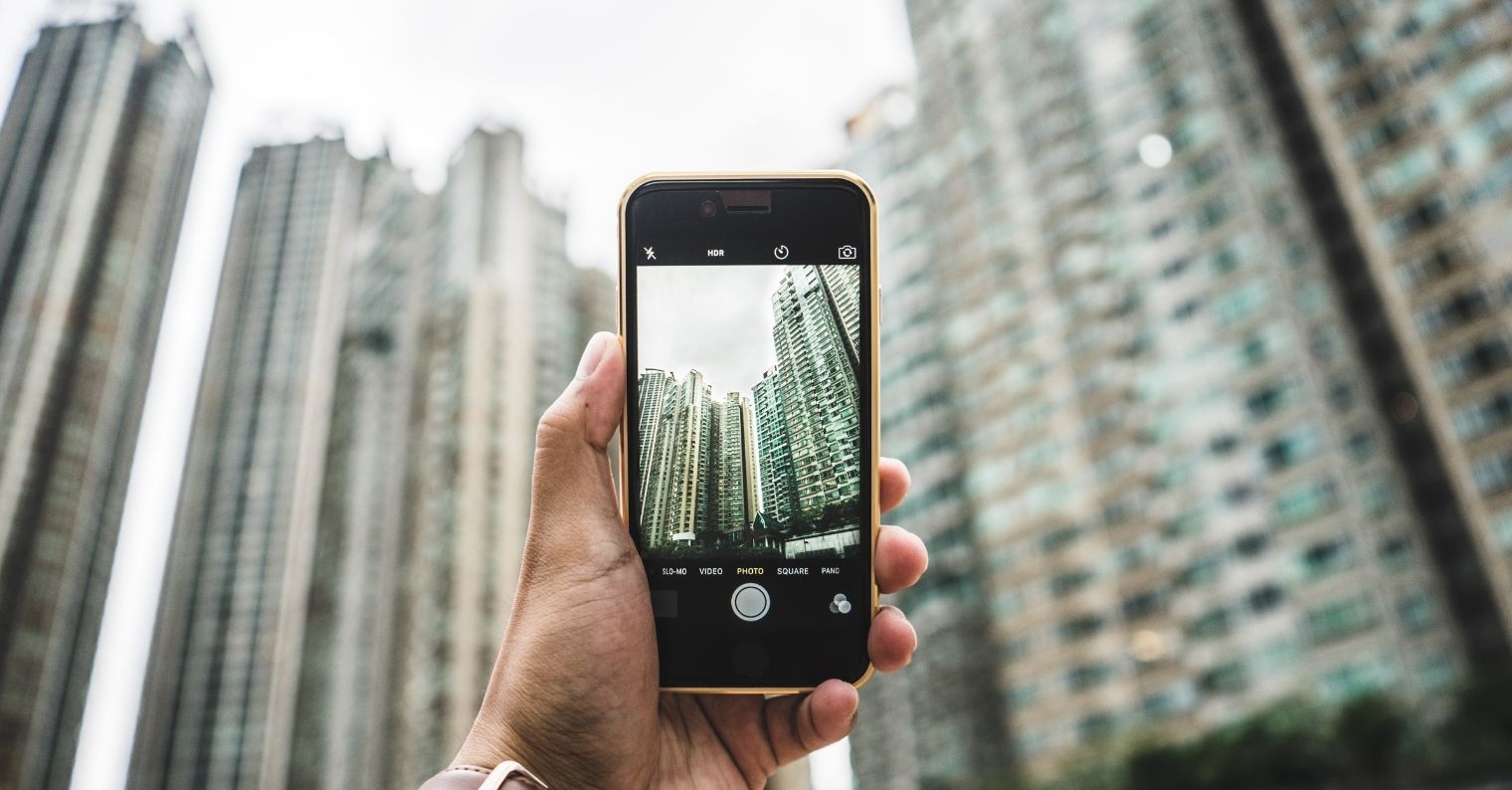 phone photographing skyscrapers