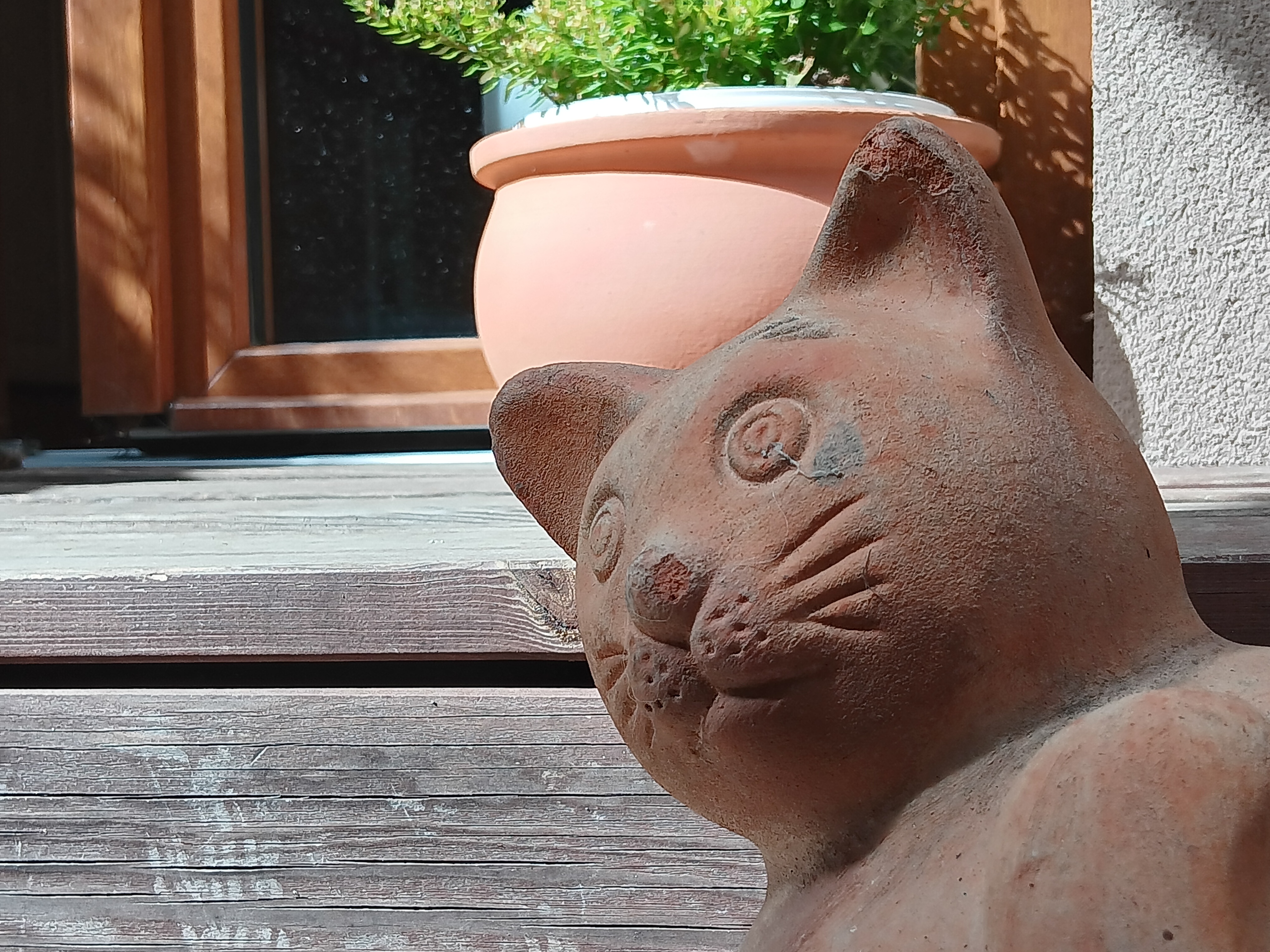 terracotta cat statue