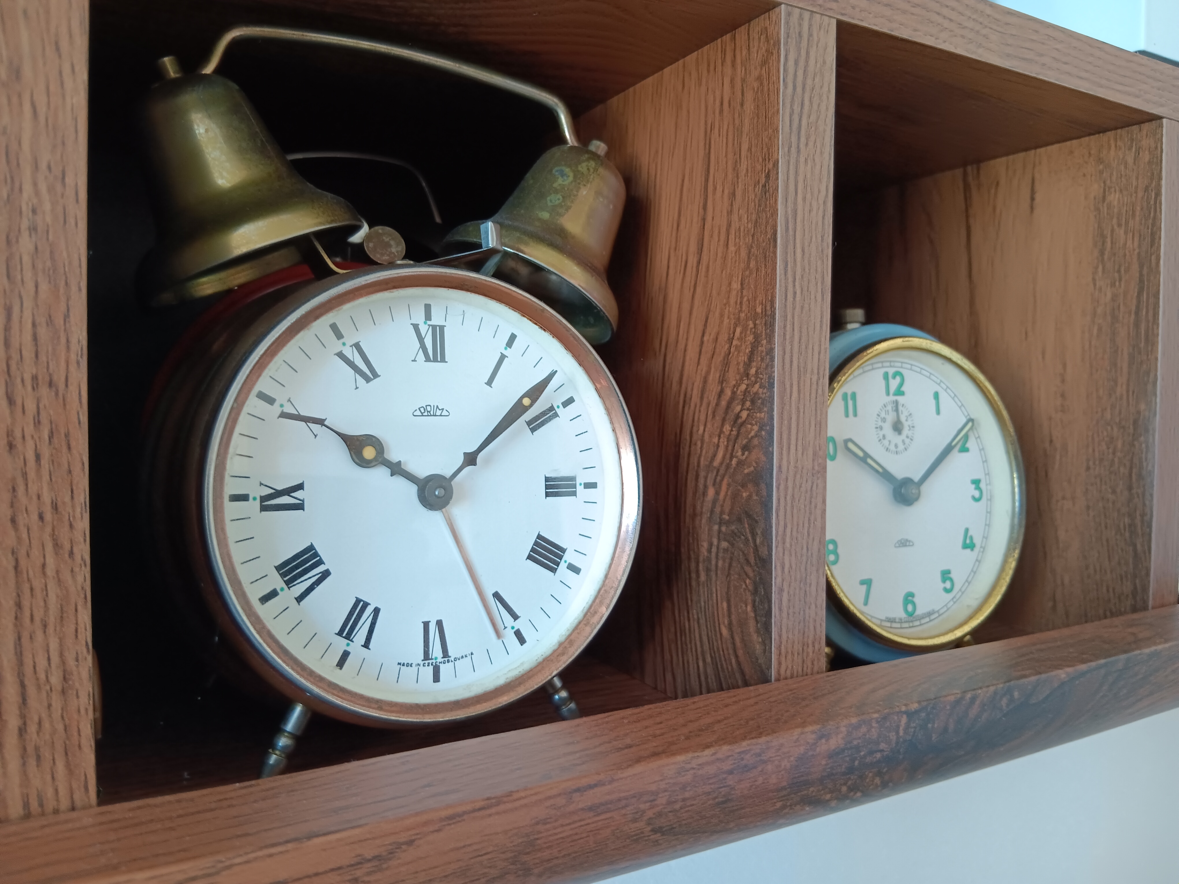 vintage alarm clocks shelf