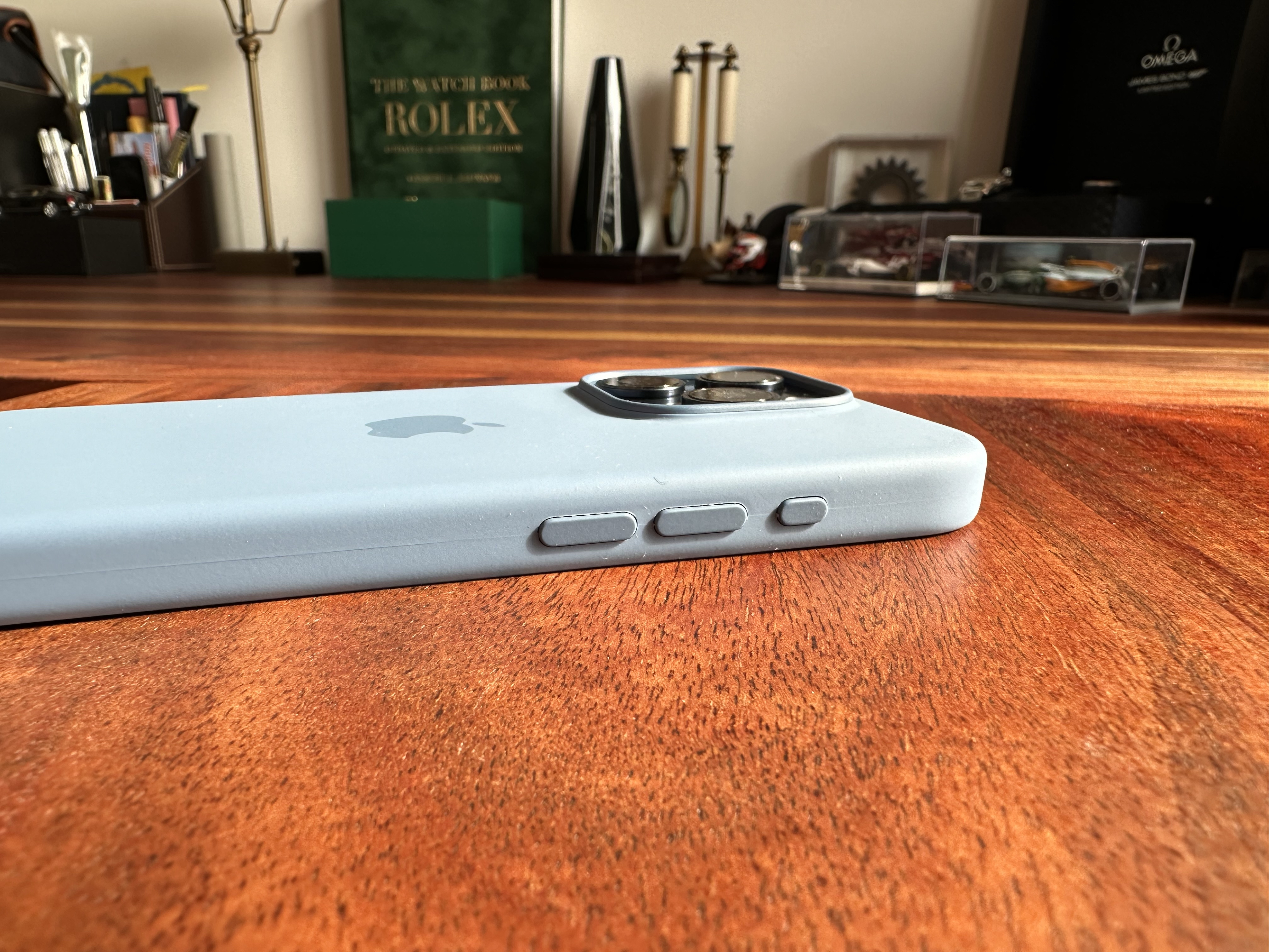 blue iphone corner view on table blue iphone corner view on table