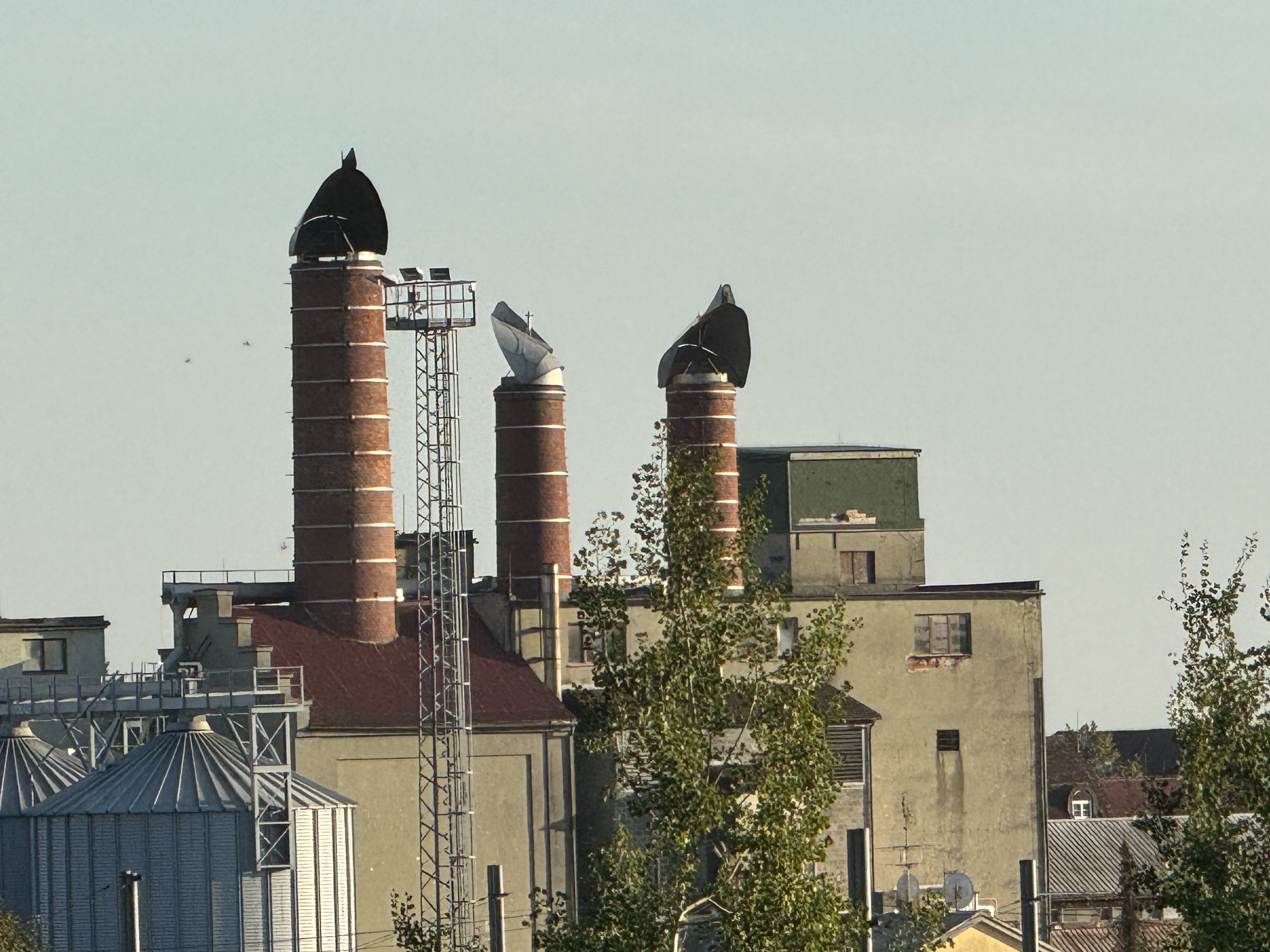 factory chimneys trees