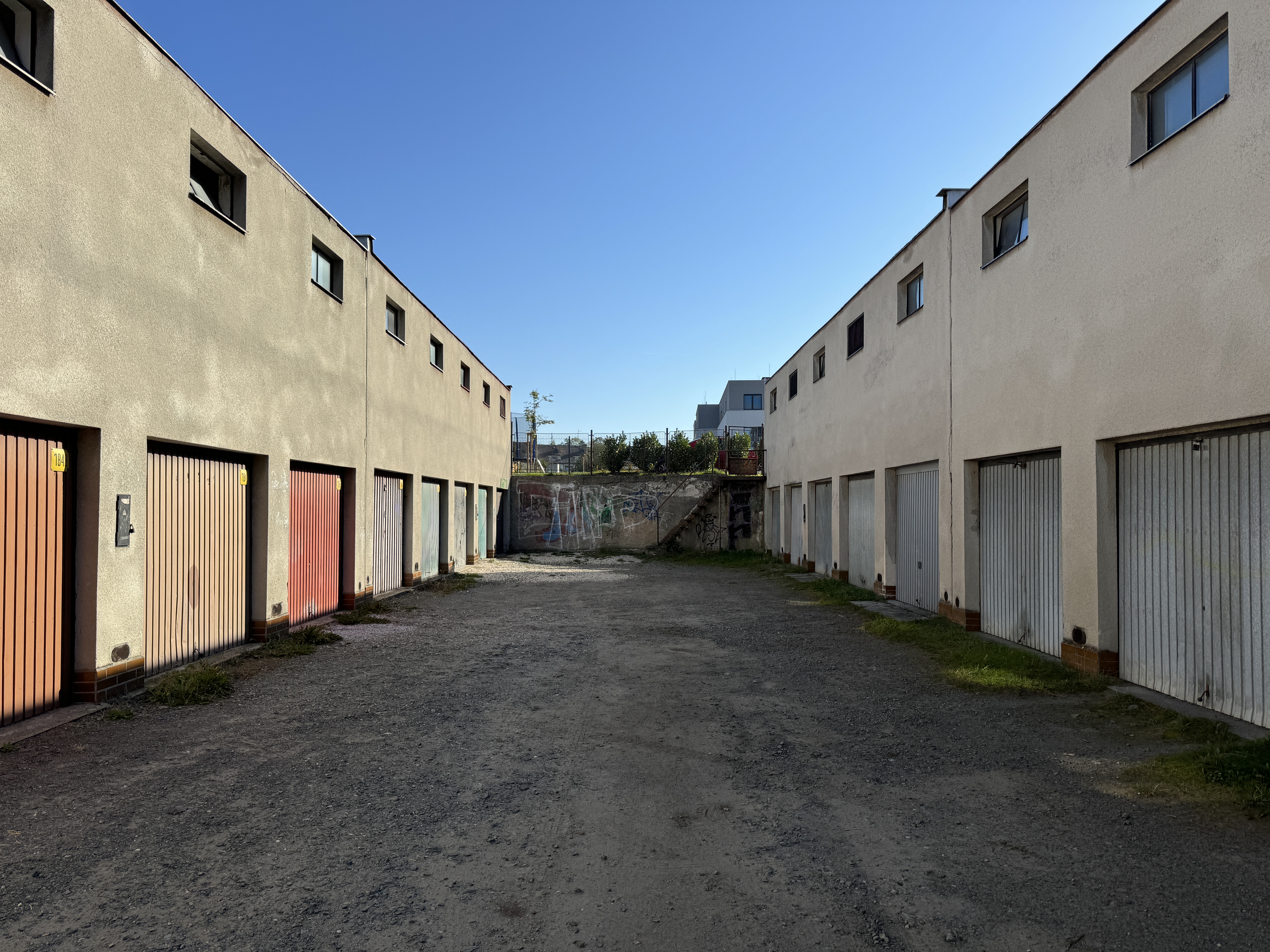 garage doors alleyway perspective