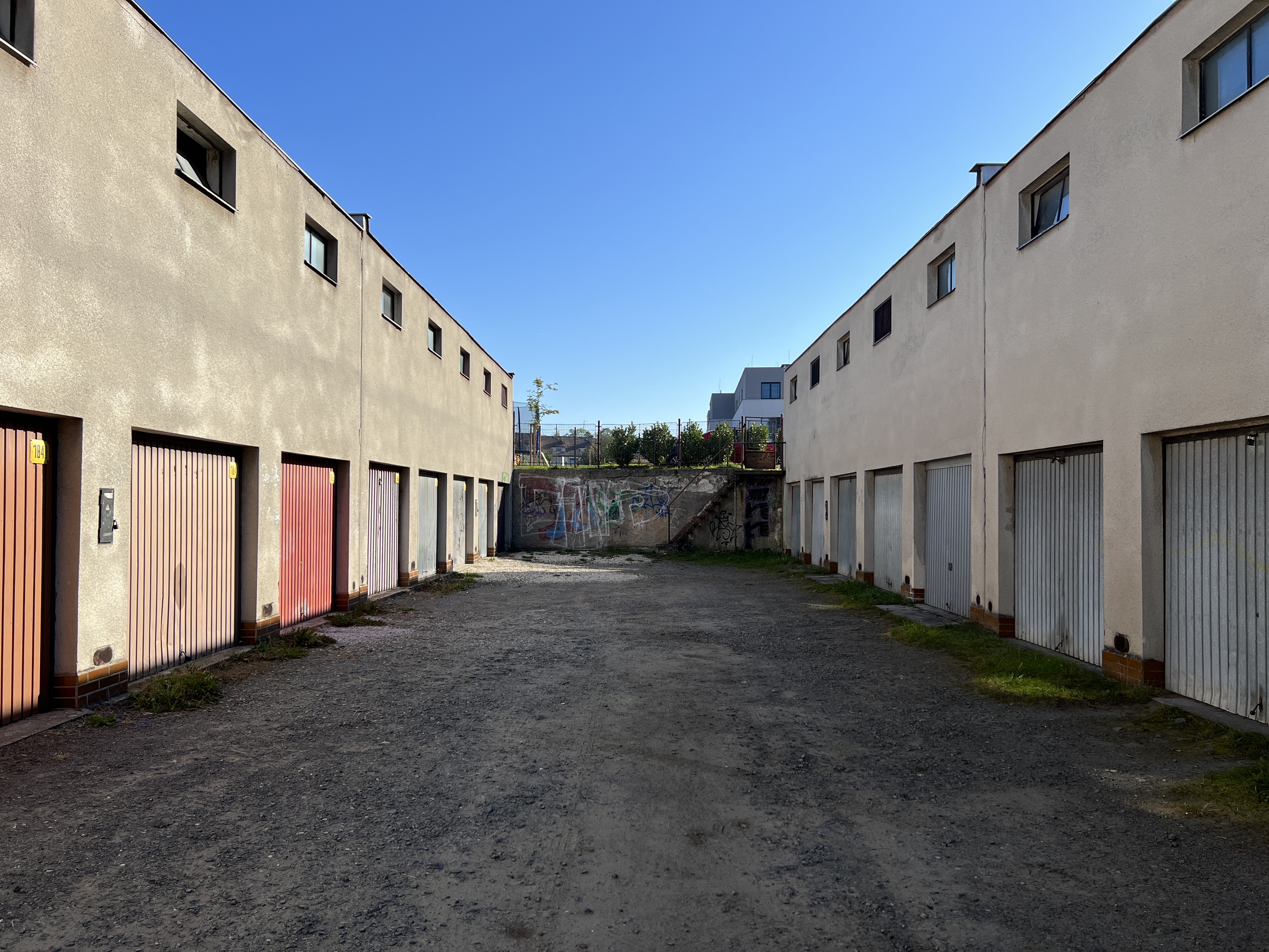 garage doors alleyway symmetry