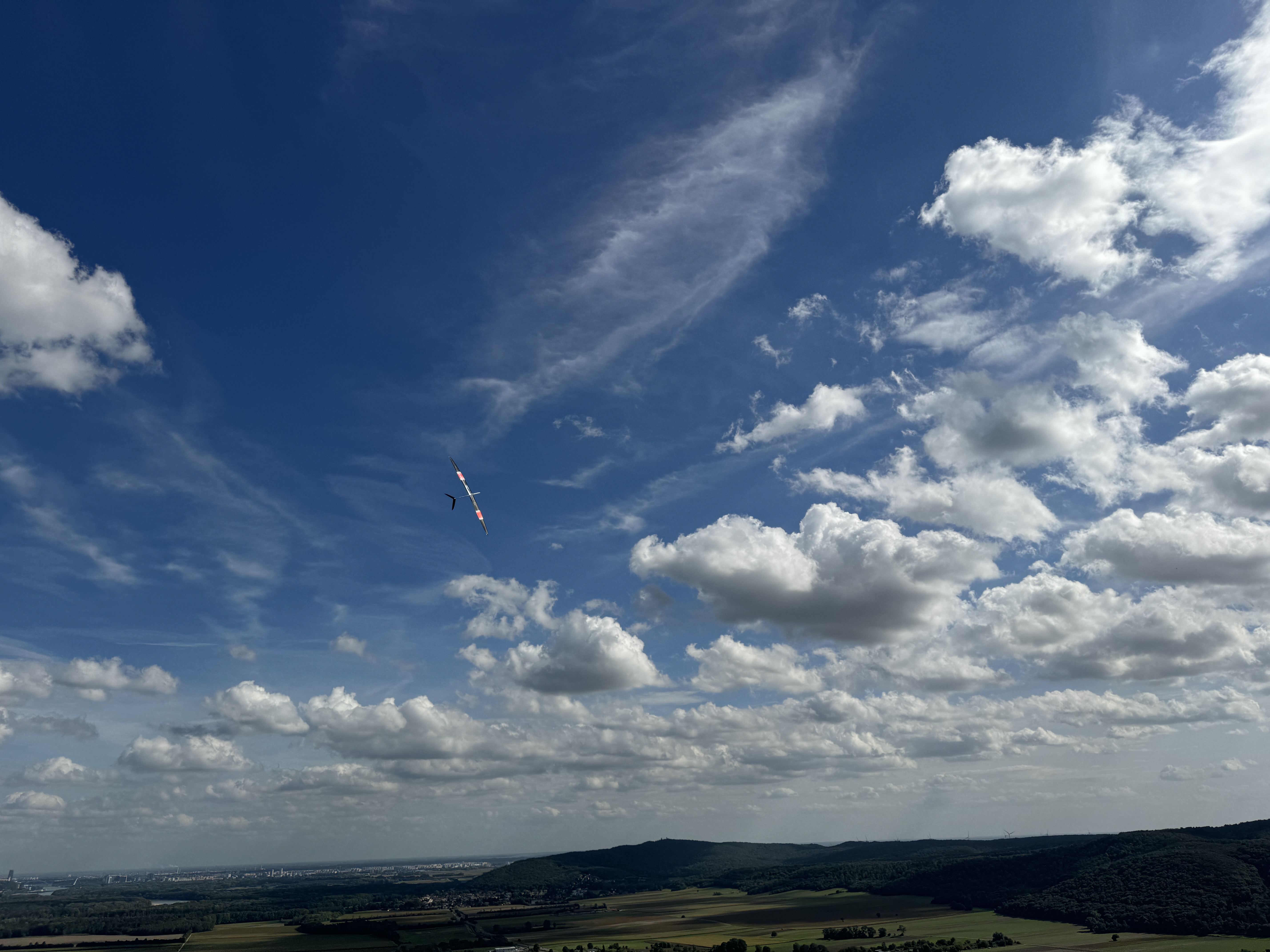 glider in blue sky