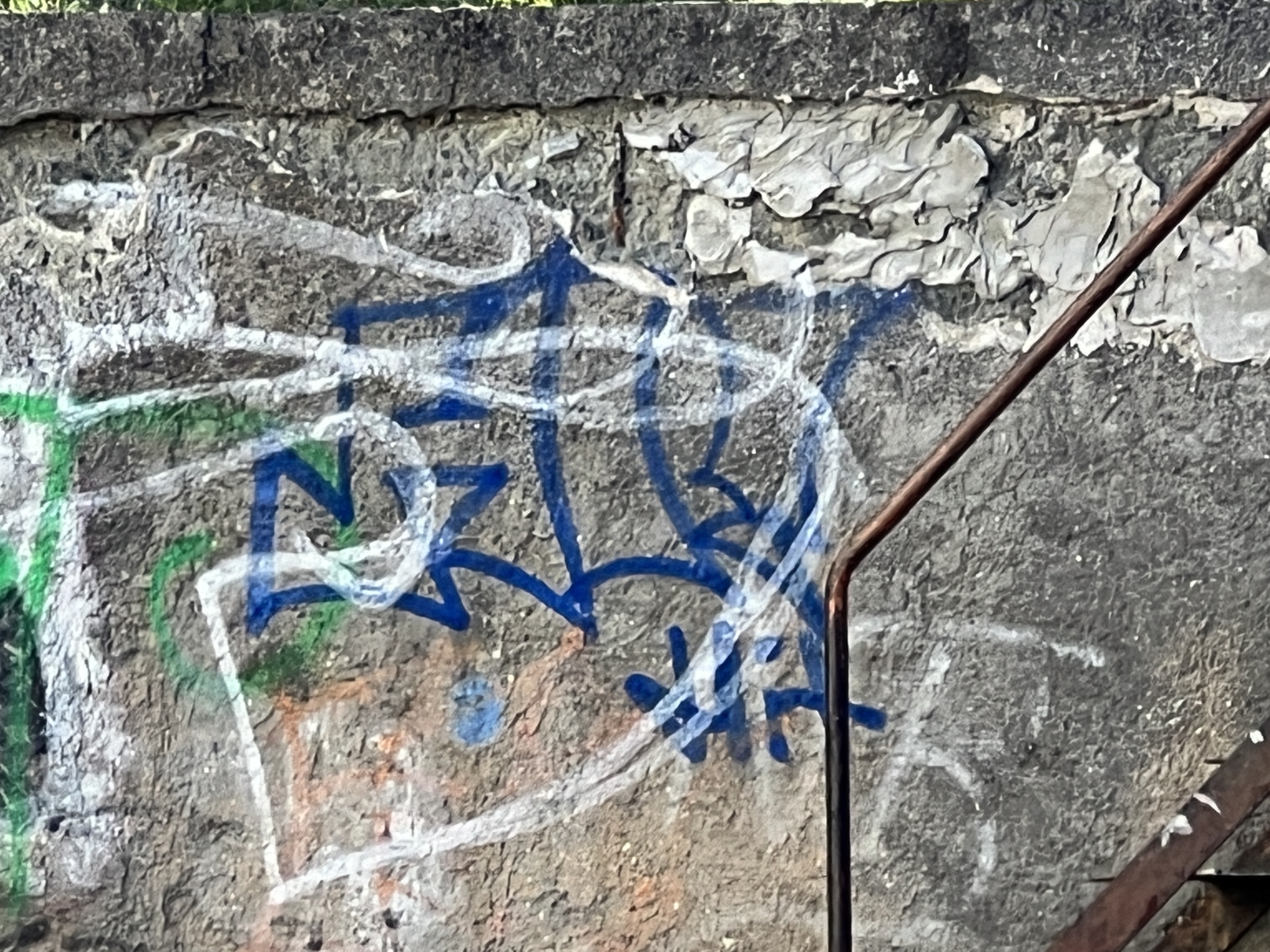 graffiti on stone wall
