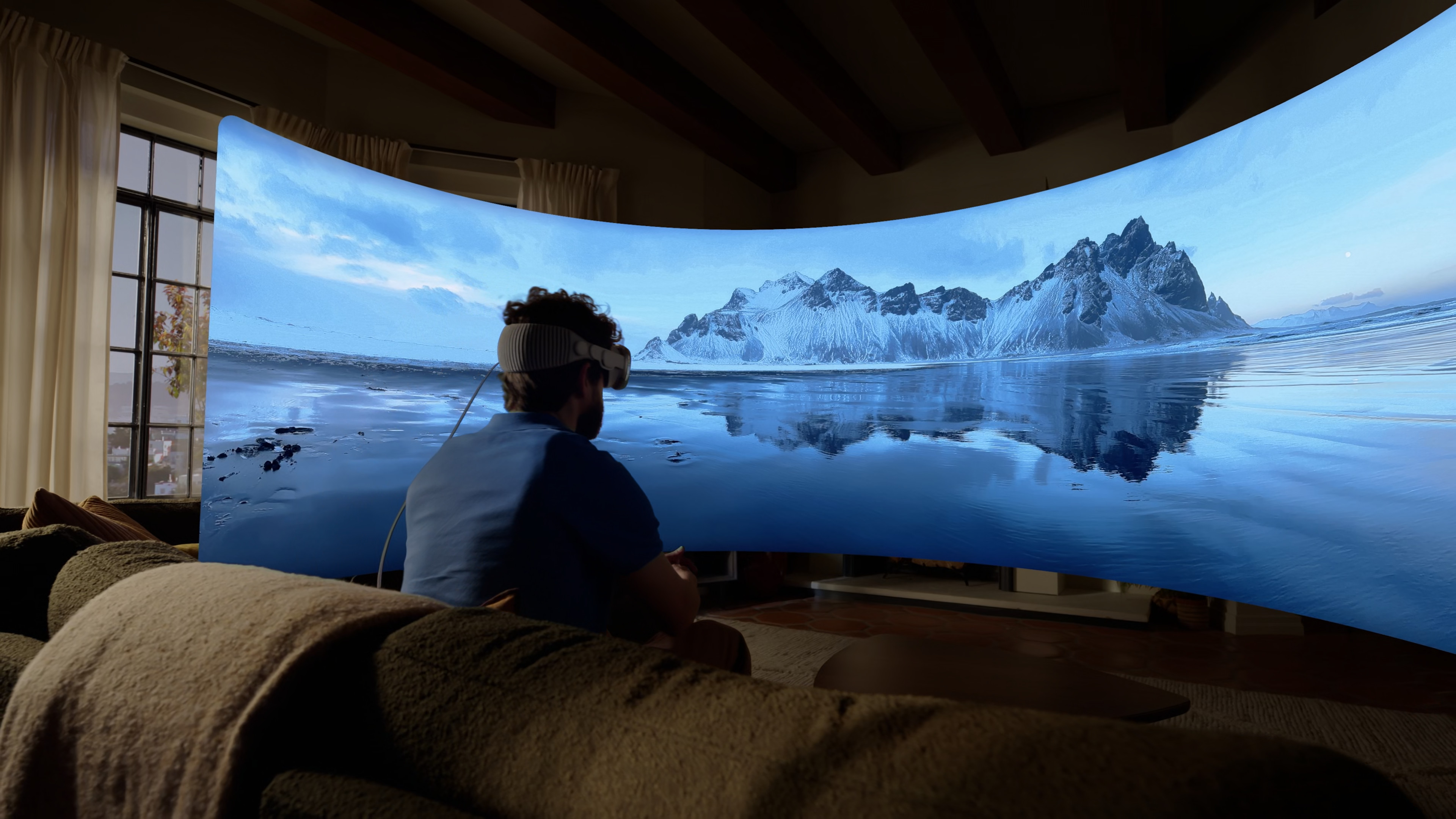 person wearing vr headset watching landscape