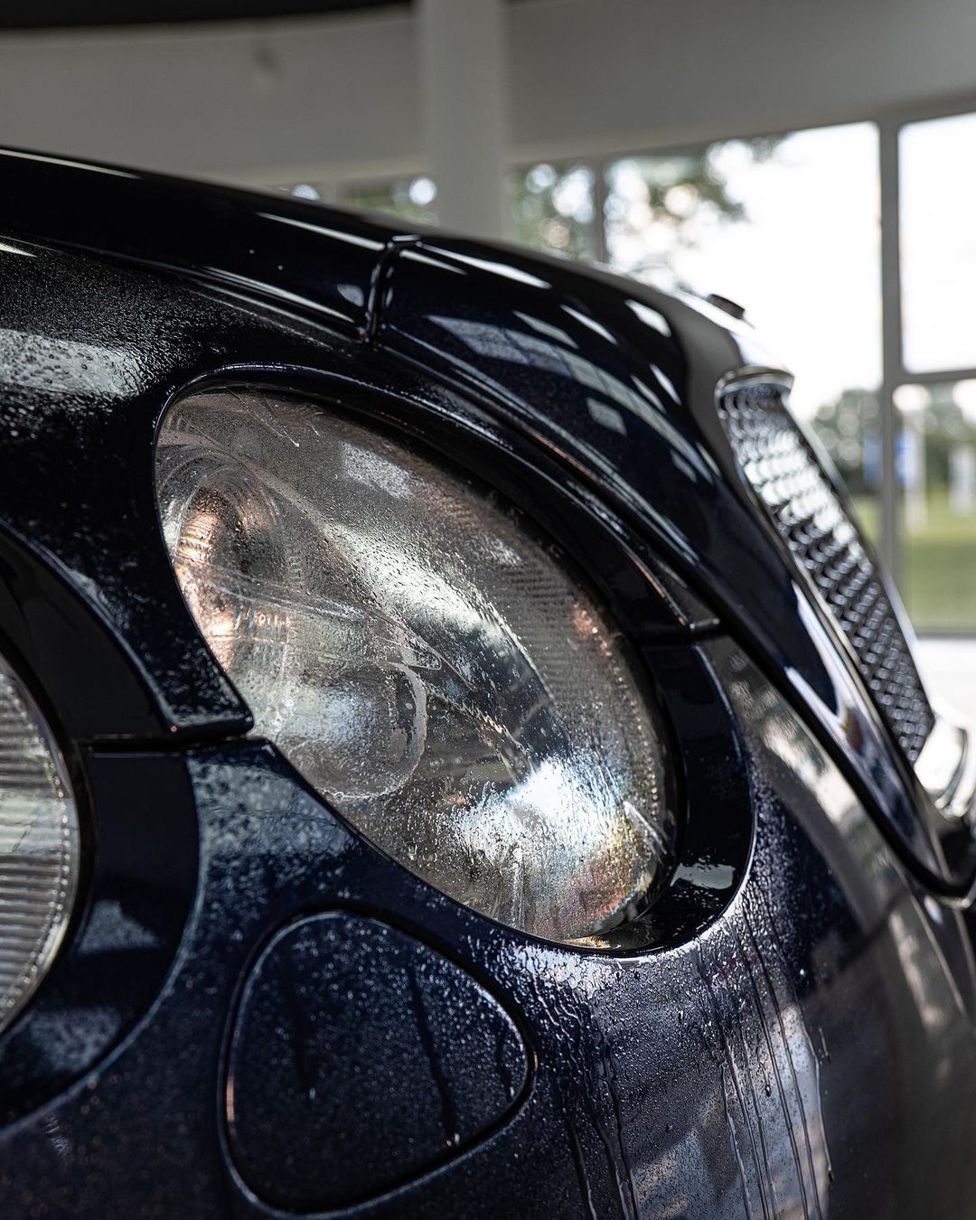 wet car headlight