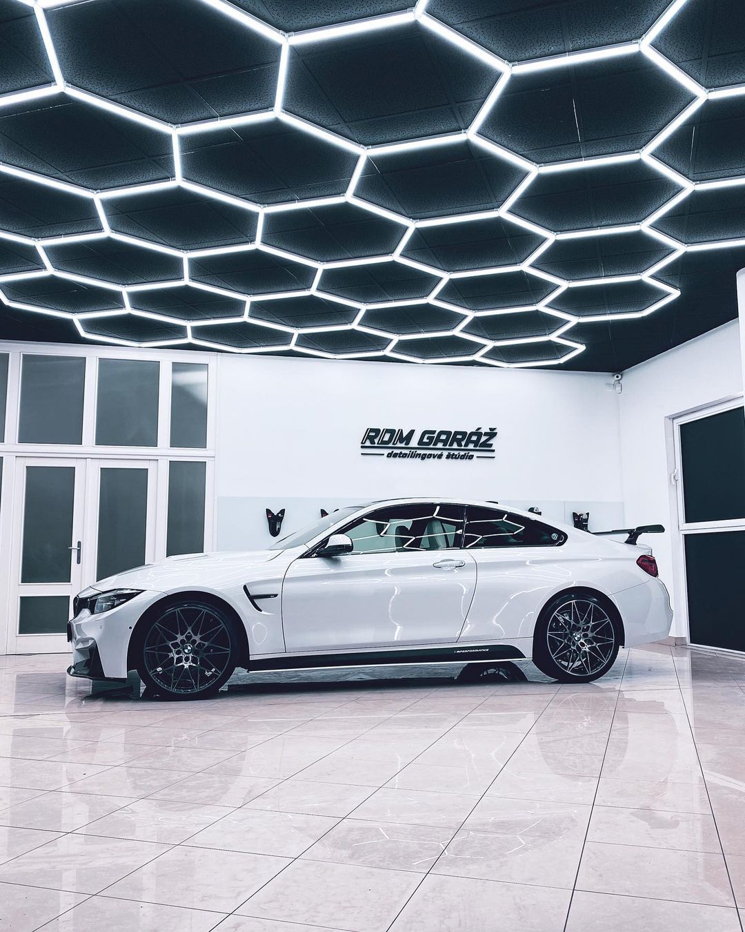 white car showroom