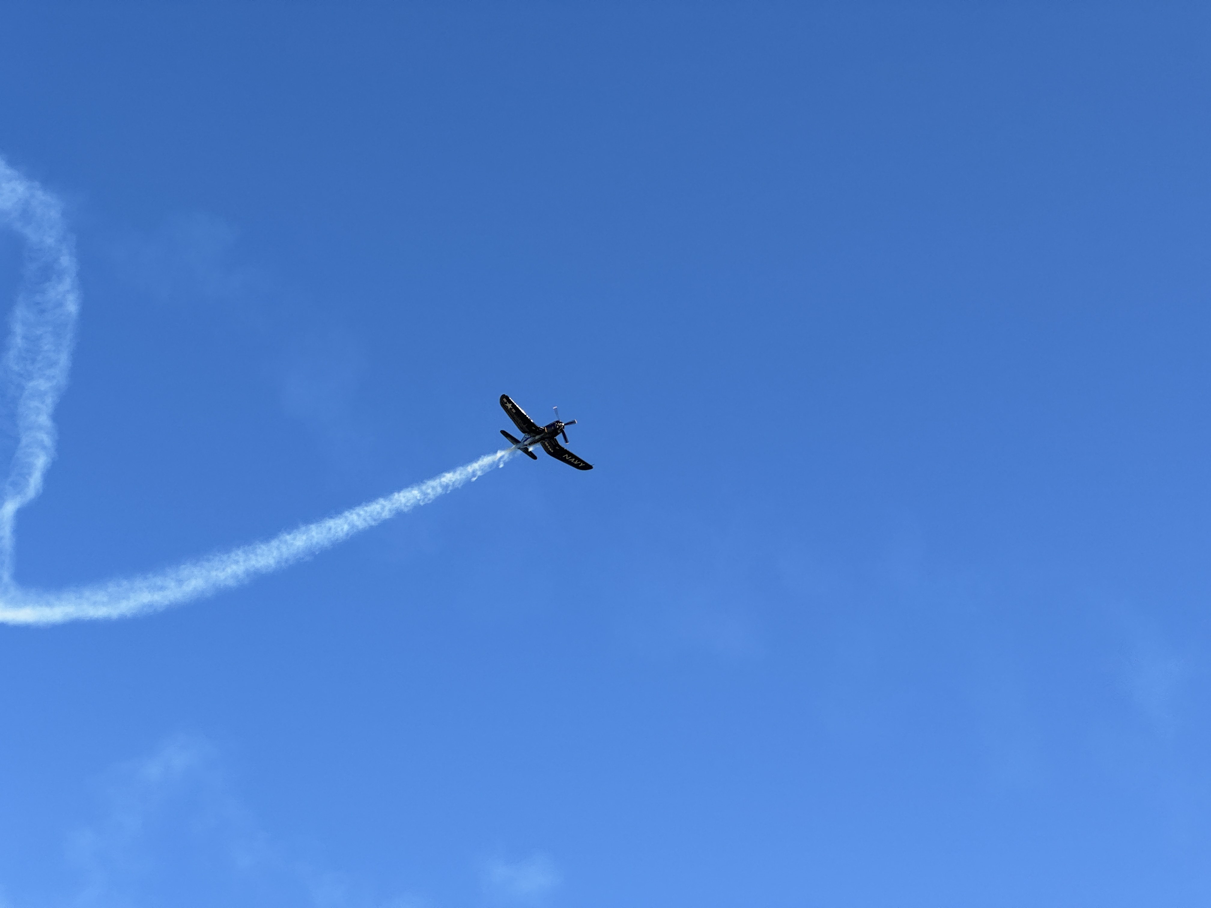 airplane acrobatics blue sky