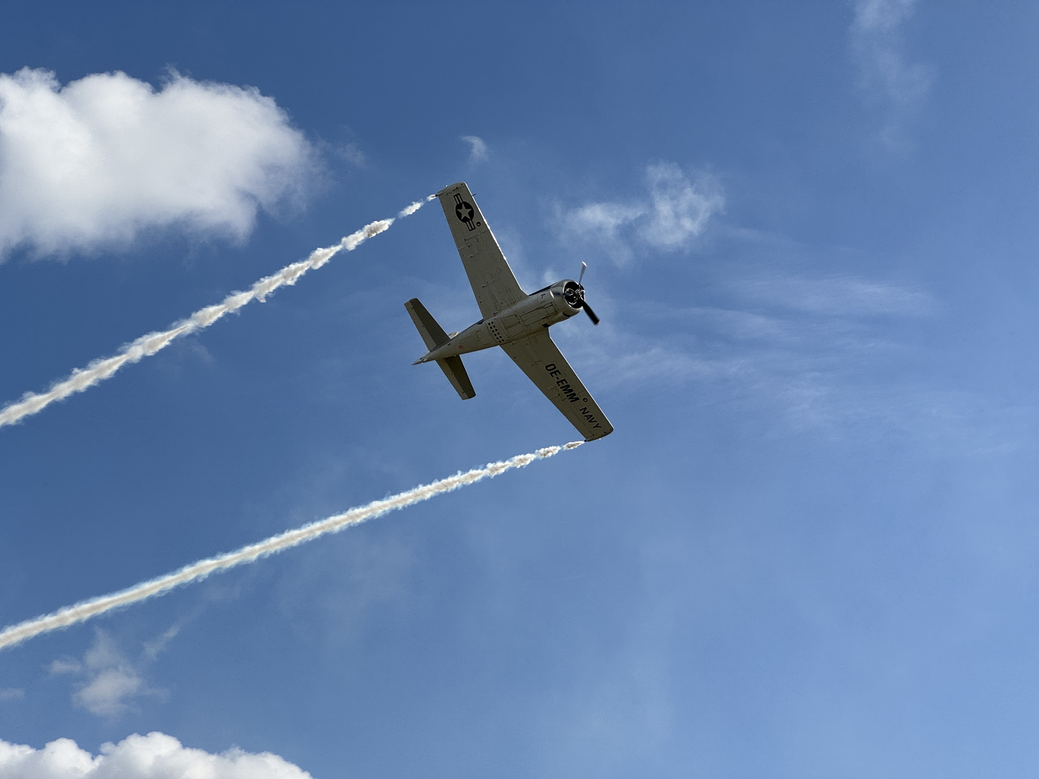 airplane blue sky clouds