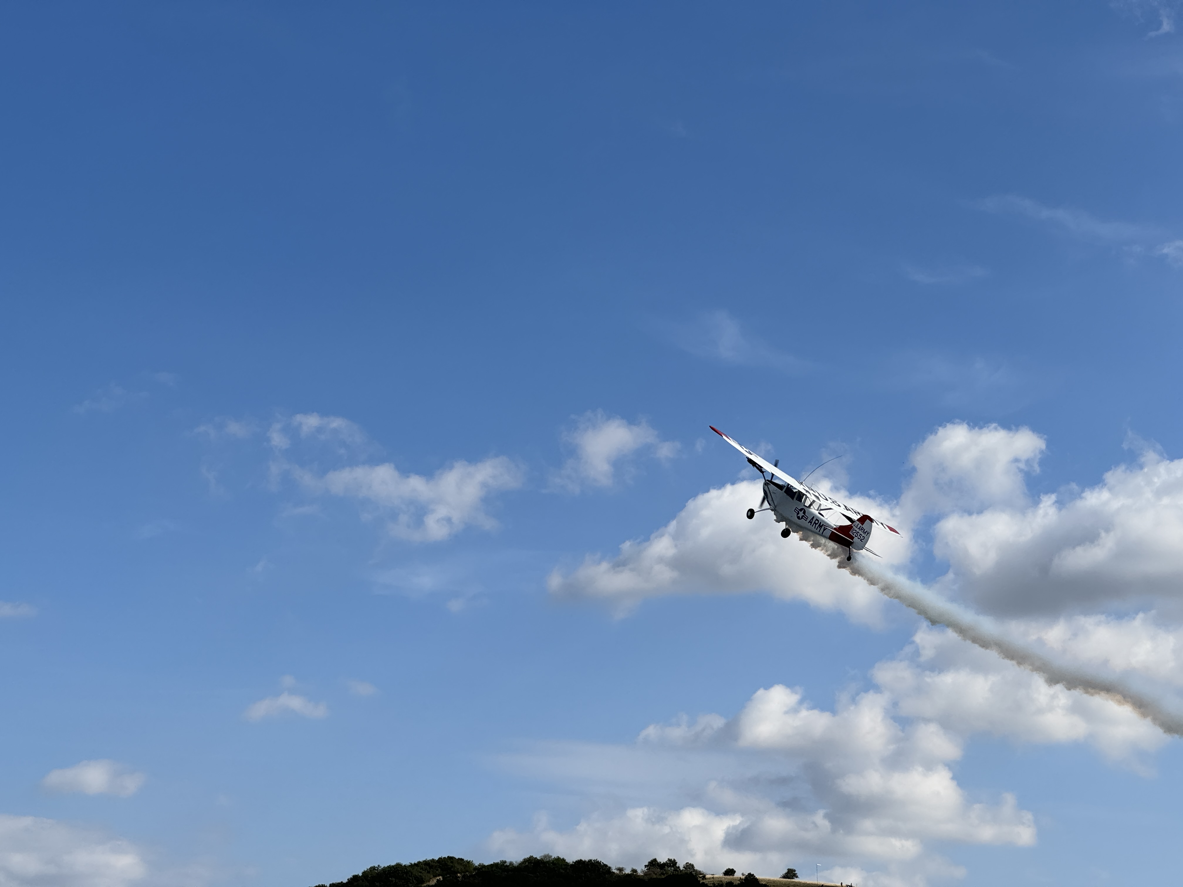airplane clouds hill