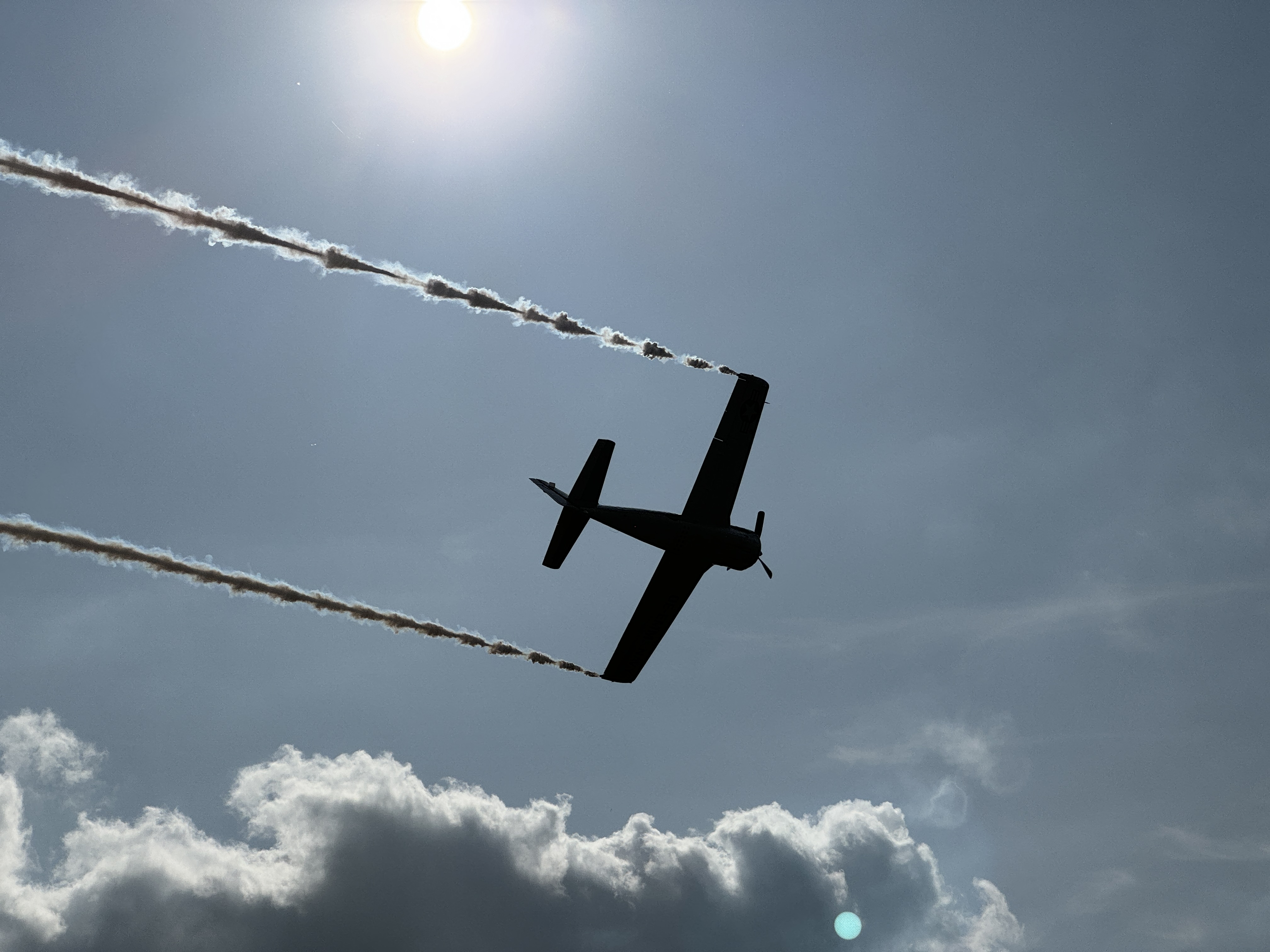 airplane silhouette sun