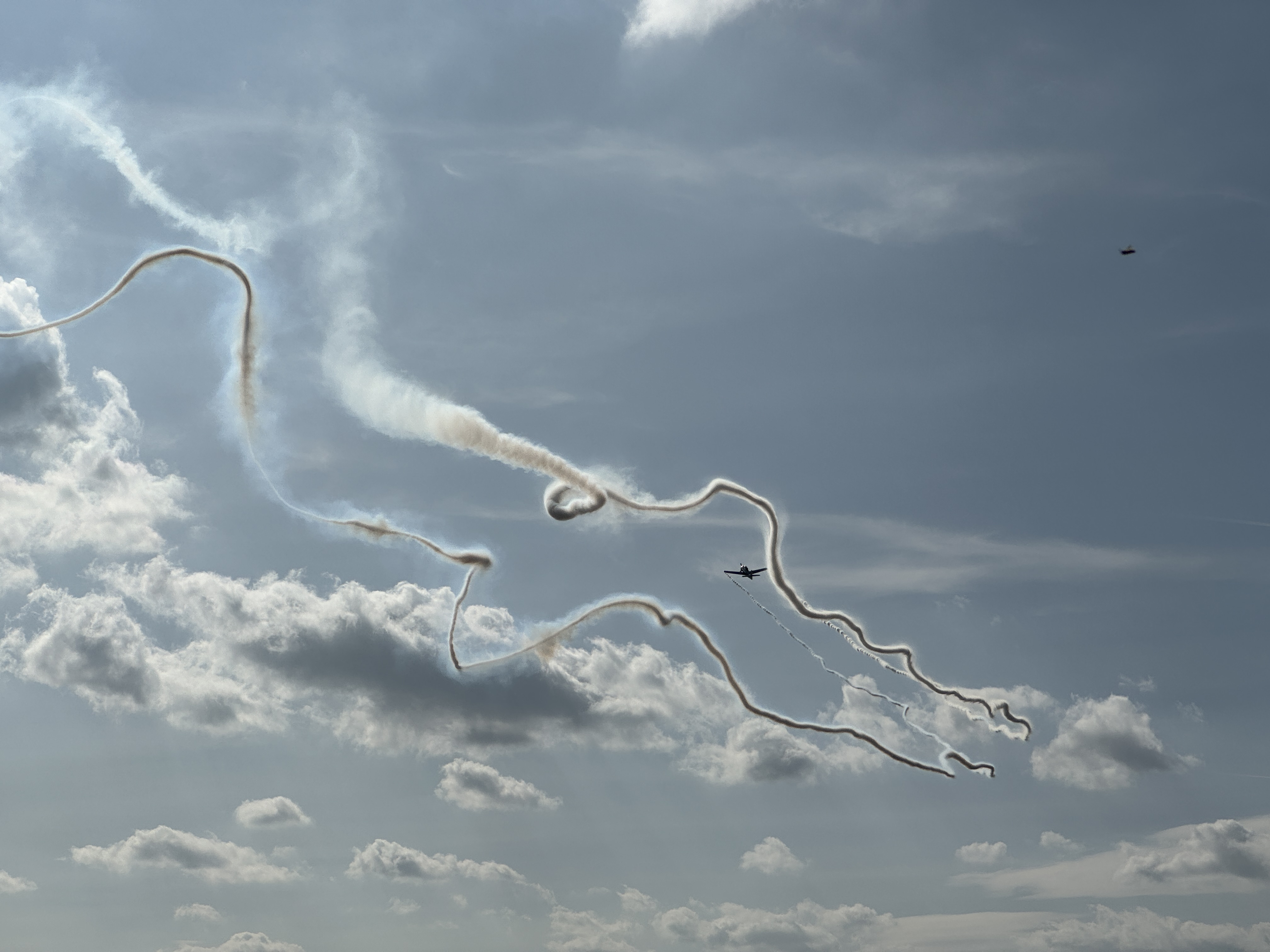 airplane smoke trails sky