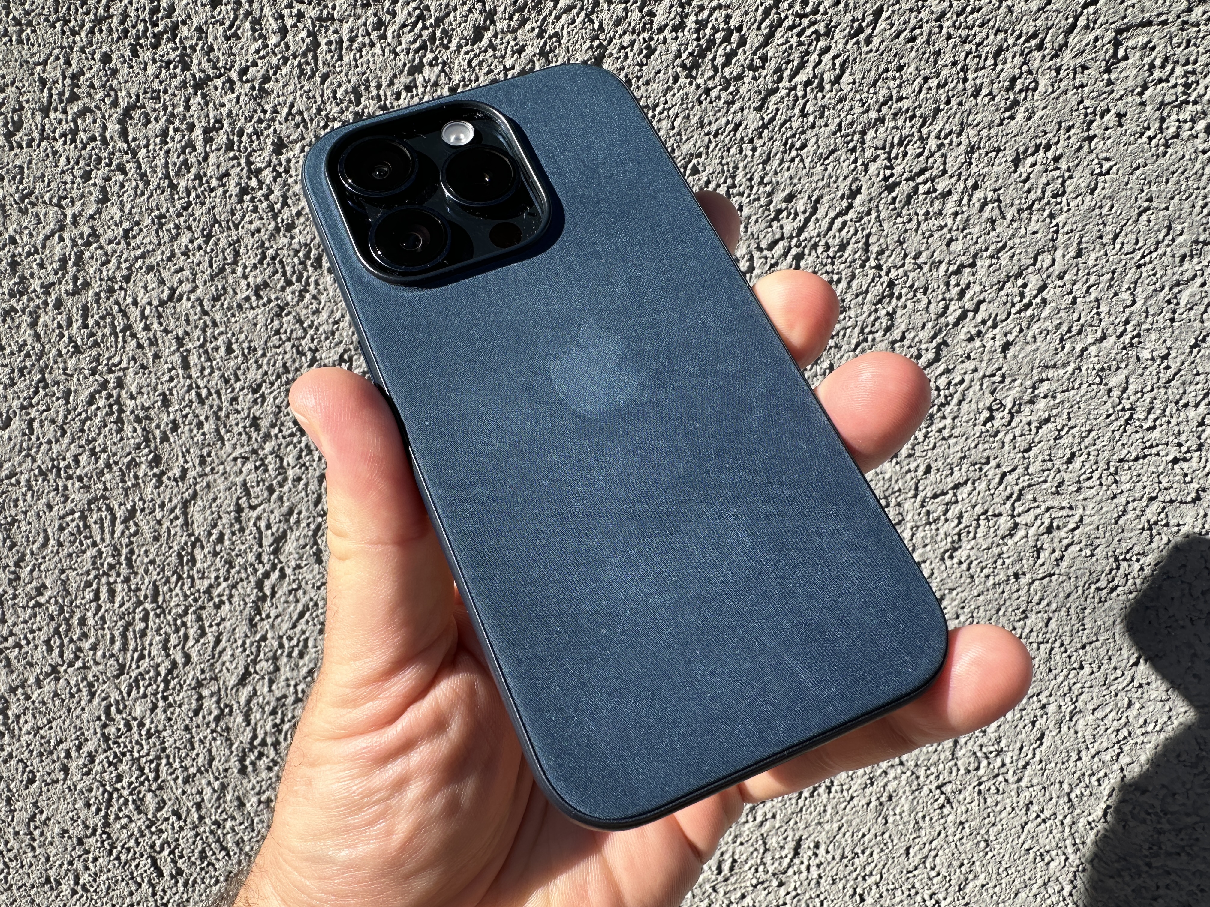 blue phone case in hand